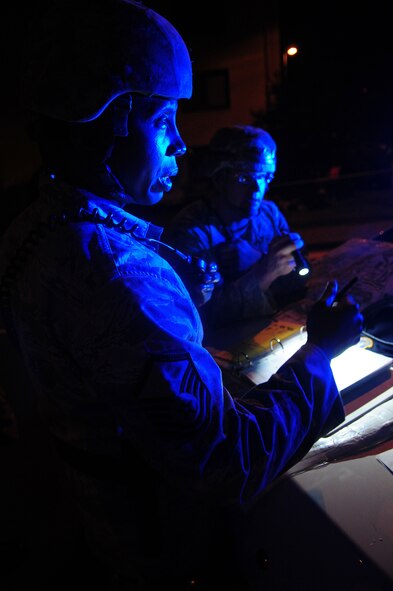 U.S. Air Force Master Sgt. Jerron Lampkin, 86th Security Forces Squadron flight chief, responds to a simulated hostile situation during an operational readiness exercise, Ramstein Air Base, Germany, July 19, 2010. An ORE incorporates a series of scenarios to evaluate a base's ability to execute operational duties under simulated wartime conditions. (U.S. Air Force photo by Airman 1st Class Desiree Esposito)