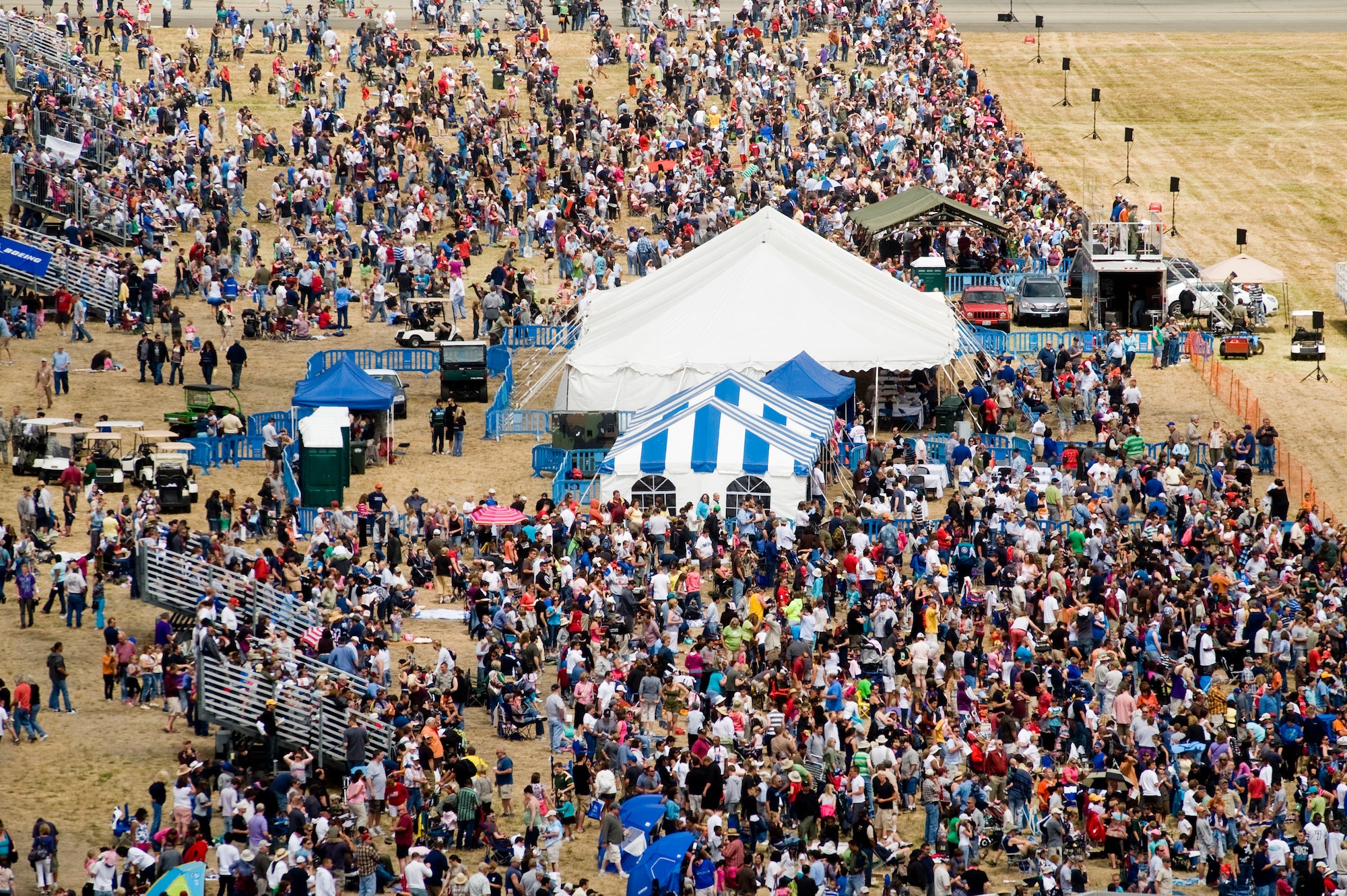 Crowds enjoy aerial displays at the JBLM Air Expo 2010 at McChord Field July 17. (U.S. Air Force Photo/Abner Guzman)