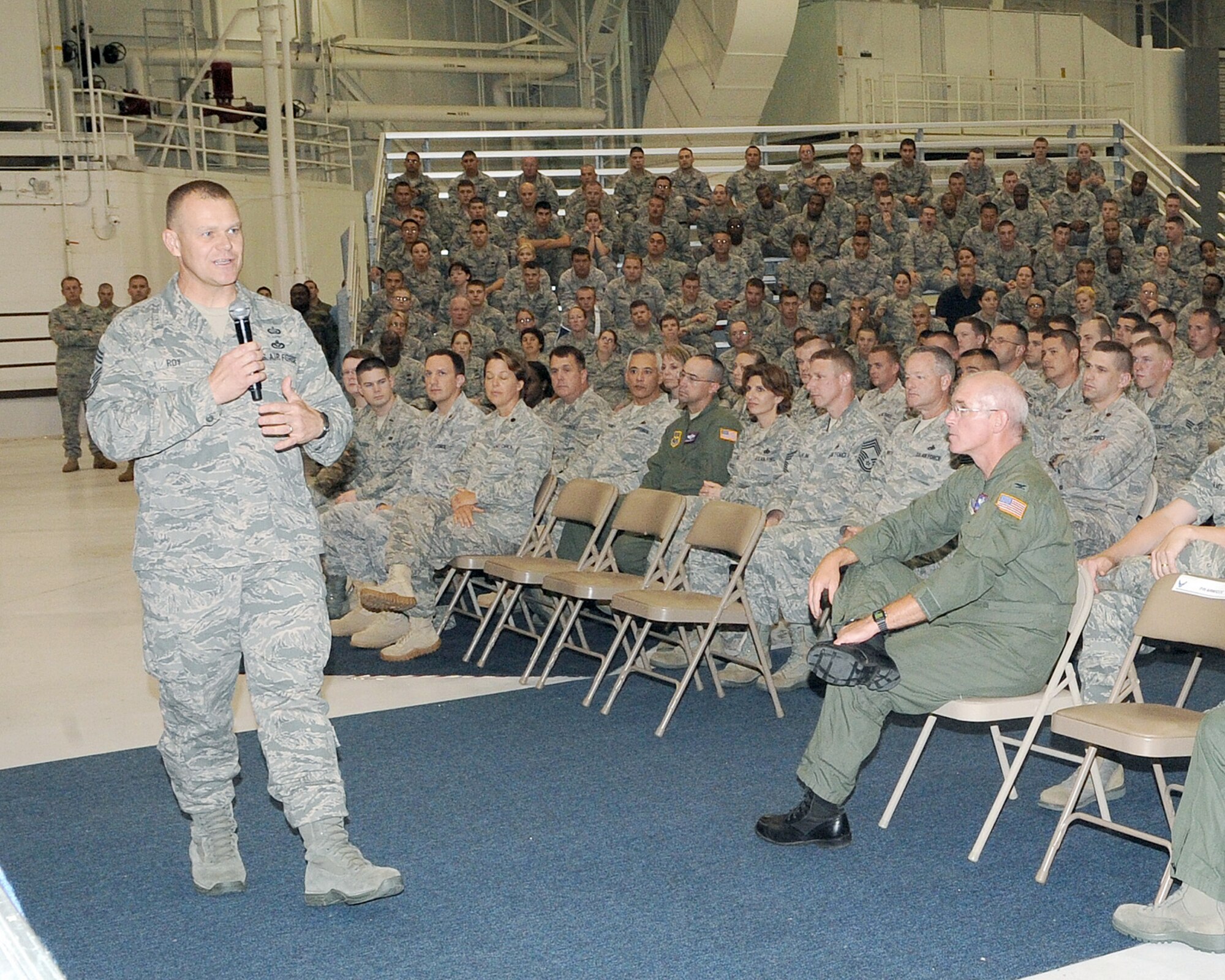 Chief Master Sgt. of the Air Force James A. Roy addresses Airmen from the 319th Air Refueling Wing during an All-Call July 15, 2010 at Grand Forks Air Force Base, N.D. (U.S. Air Force photo/Tech. Sgt. Johnny Saldivar)