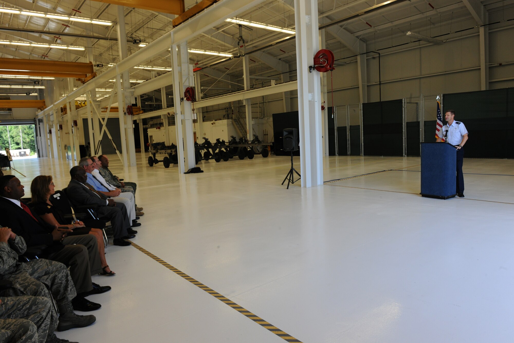 MOODY AIR FORCE BASE, Ga. -- Col. Gary Henderson, 23rd Wing commander, speaks to the local community and Team Moody during the TF-34 Engine Repair Facility ribbon-cutting ceremony here July 16. The TF-34 engine allows the A-10C Thunderbolt II aircraft to provide close air support to ground forces. (U.S. Air Force photo by Airman 1st Class Benjamin Wiseman/RELEASED)