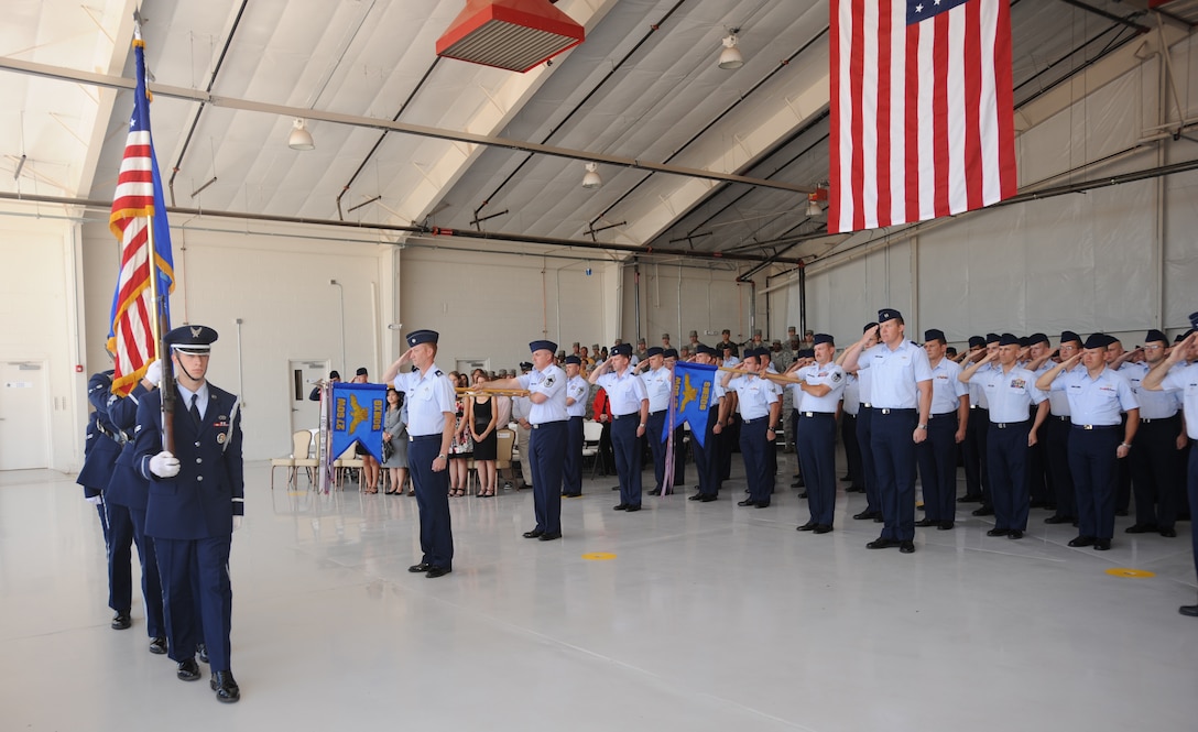 27 SOMXG salute the colors during change of command