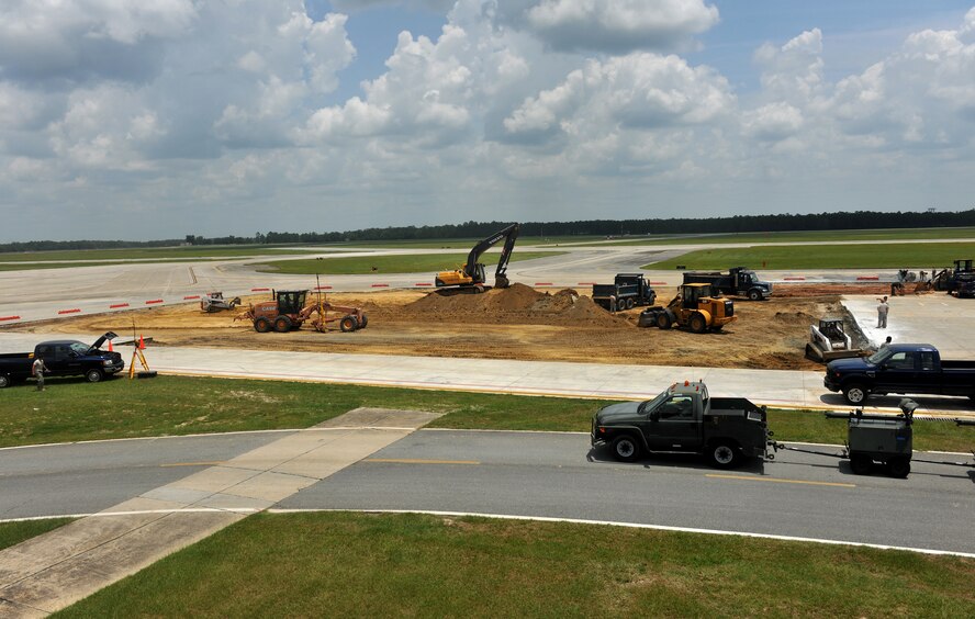 MOODY AIR FORCE BASE, Ga. -- The 823rd RED HORSE Squadron from Hurlburt Field, Fla., replace concrete at a construction site July 15. The concrete being removed from the airfield has been at Moody since the base was built in 1942. (U.S. Air Force photo/Airman Class 1st Joshua Green)(RELEASED) 