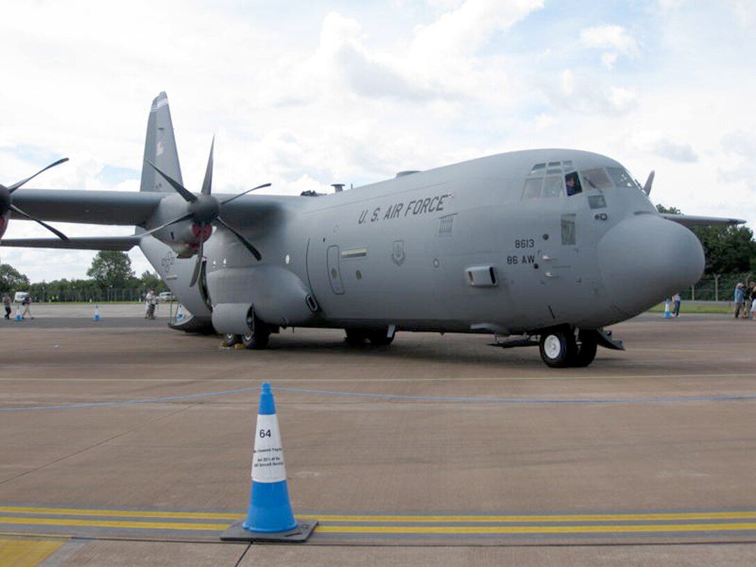A C-130J Super Hercules sits on the ramp at the start of the Royal International Air July 17, 2010, at Royal Air Force Fairford, England. The tattoo is held annually as "the world's largest military air show."  The C-130J is based out of Ramstein Air Base, Germany. (U.S. Air Force photo/Chief Master Sgt. Greg Wade)