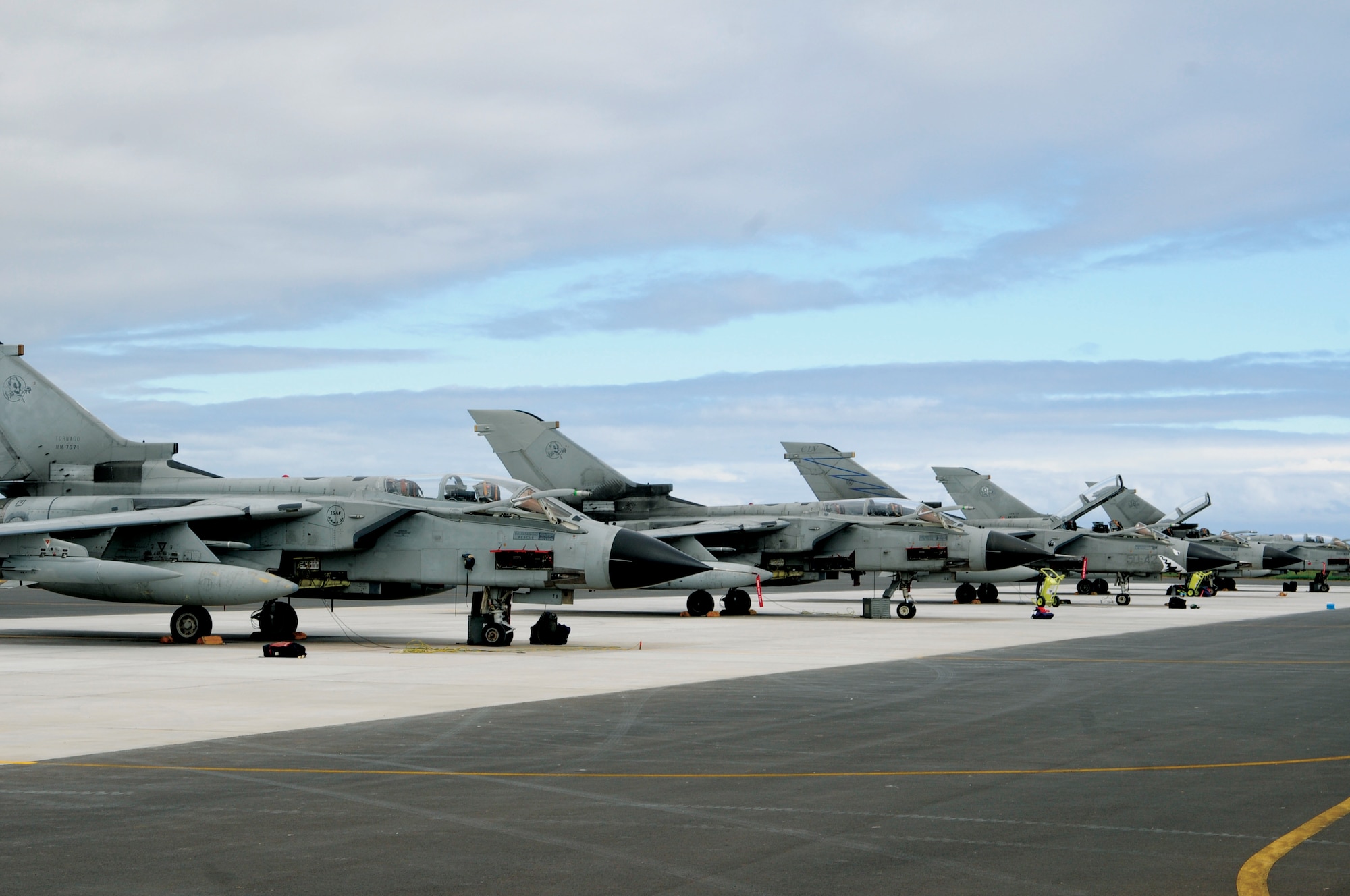 welve Italian Tornado aircraft take a quick stop and park at Lajes ramp July 15 on their way home after attending Red Flag Alaska 2010.  On the same day, Lajes Airmen also hosted six Pakistan fighter aircraft and about 100 support personnel, who were on their first deployment to Red Flag, Nellis Air Force Base, Nev. (U.S. Air Force photo/Tech. Sgt. Darrell I. Dean) 