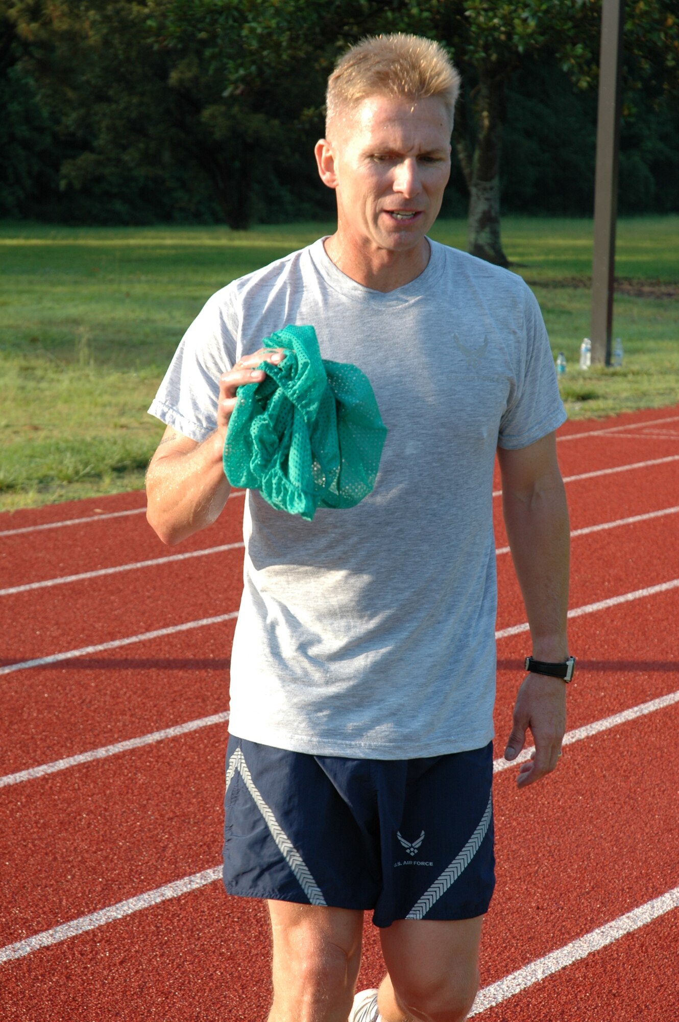 Tech. Sgt. Ralph Vaughn completed the 1.5 mile run in less than nine minutes and received a score of 100 on his bi-annual physical fitness test July 11, 2010 at the base running track here. Sergeant Vaughn is a 315th Airlift Wing avionics technician here. (U.S. Air Force photo/Staff Sgt. Shane Ellis)