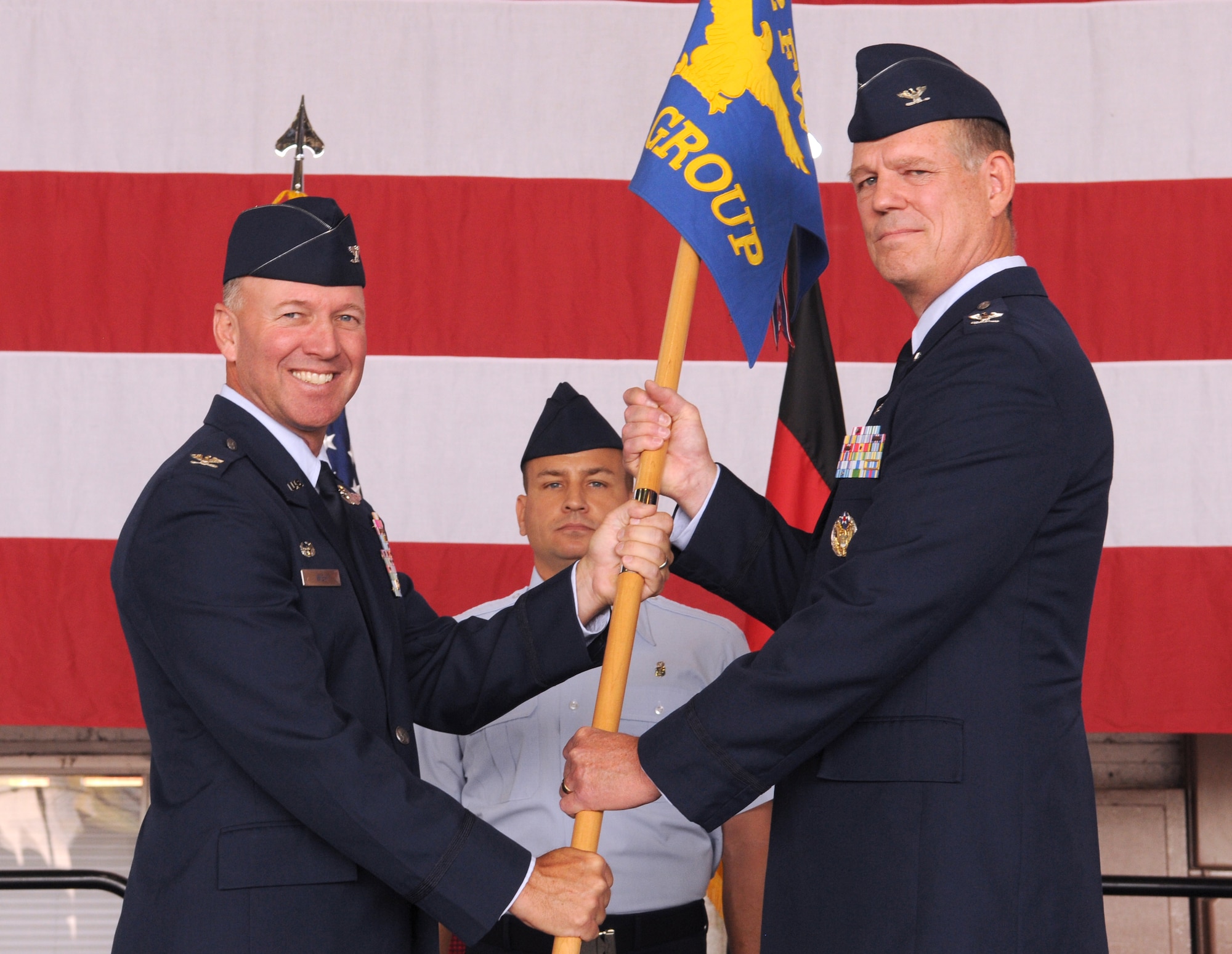 SPANGDAHLEM AIR BASE, Germany – Col. Robert Bowersox, 52nd Medical Group commander, accepts command of the 52nd MDG by receiving the unit’s guidon from Col. Tip Wight, 52nd Fighter Wing commander, July 8. Colonel Bowersox took command from Col. Lorrie Cappellino. (U.S. Air Force photo/Staff Sgt. Benjamin Wilson)