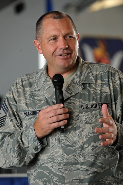 MOODY AIR FORCE BASE, Ga. -- Chief Master Sgt. Scott Dearduff, 9th Air Force command chief, congratulates members from Moody for their hard work and dedication during his visit here July 16. Chief Dearduff will be retiring on July 23 after nearly 30 years of service. (U.S. Air Force photo by Airman 1st Class Benjamin Wiseman/RELEASED)