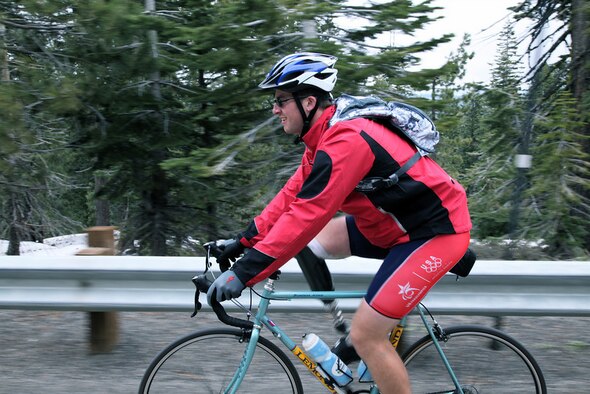 Senior Airman Brian Petras from the 50th Airlift Squadron at Little Rock Air Force Base, Ark., is participating in the Sea to Shining Sea ride hosted by World T.E.A.M. Sports and sponsored by State Farm. The team of 20 riders is composed of primarily wounded, ill, or injured servicemembers cycling across America, which started in San Francisco, Calif., and will end at Virginia Beach, Va., July 24. (Photo by Austin Smithard) 