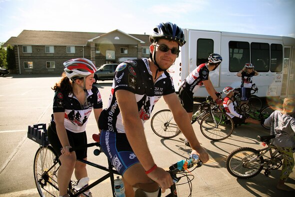 Senior Airman Brian Petras from the 50th Airlift Squadron at Little Rock Air Force Base, Ark., is participating in the Sea to Shining Sea ride hosted by World T.E.A.M. Sports and sponsored by State Farm. The team of 20 riders is composed of primarily wounded, ill, or injured servicemembers cycling across America, which started in San Francisco, Calif., and will end at Virginia Beach, Va., July 24.  (Photo by Austin Smithard)
