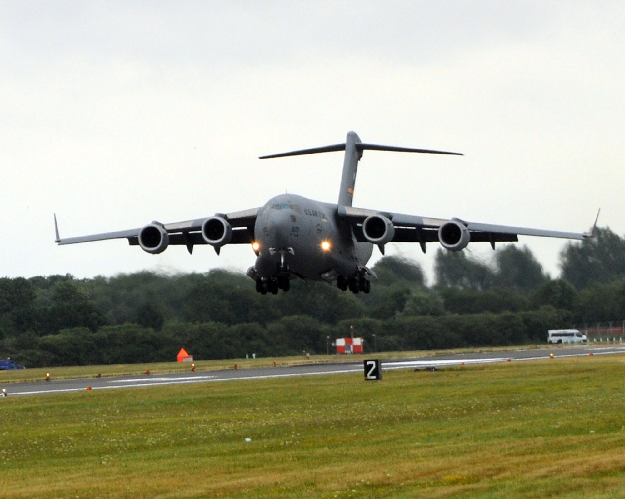 RAF FAIRFORD, United Kingdom - A C-17 lands after performing for spectators July 18 at the Royal International Air Tattoo. (U.S. Air Force photo by Staff Sgt. Joel Mease)