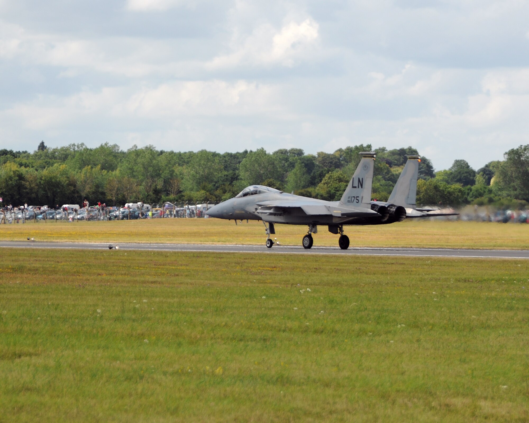 RAF FAIRFORD, United Kingdom - An F-15 Eagle lands after performing for spectators July 17 at the Royal International Air Tattoo. It is estimated more than 180,000 people attended the tattoo. (U.S. Air Force Photo by Staff Sgt. Joel Mease)
