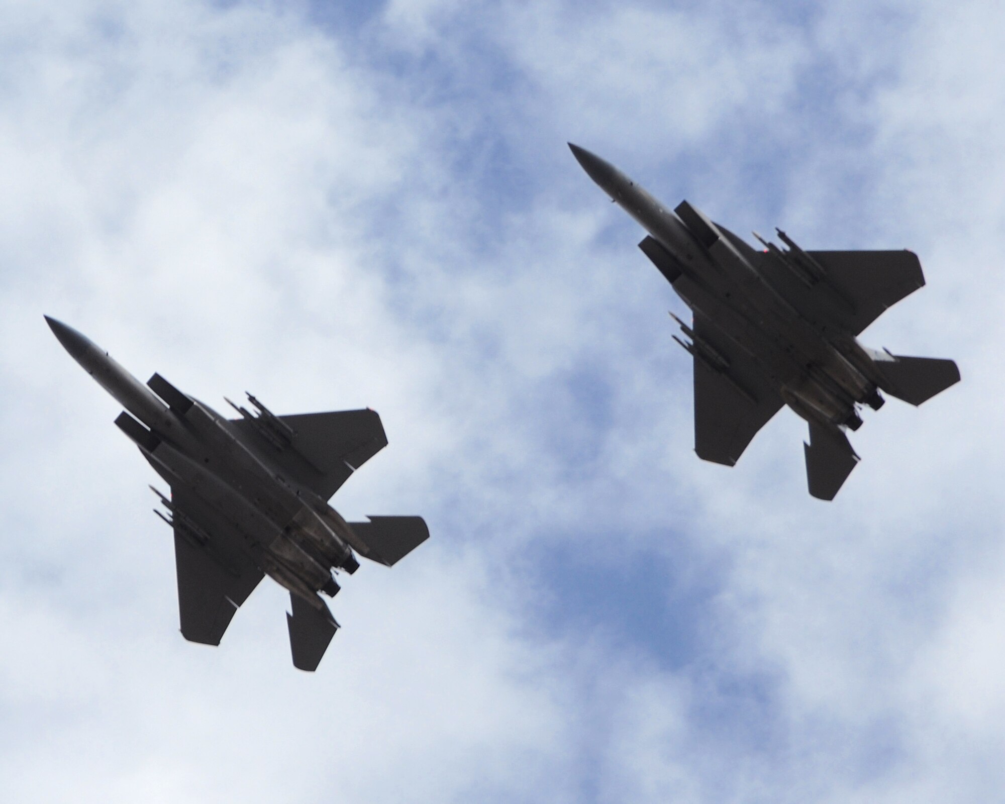 RAF FAIRFORD, United Kingdom - F-15 Eagles from Langley Air Force Base perform for spectators July 17 at the Royal International Air Tattoo. (U.S. Air Force Photo by Staff Sgt. Joel Mease)