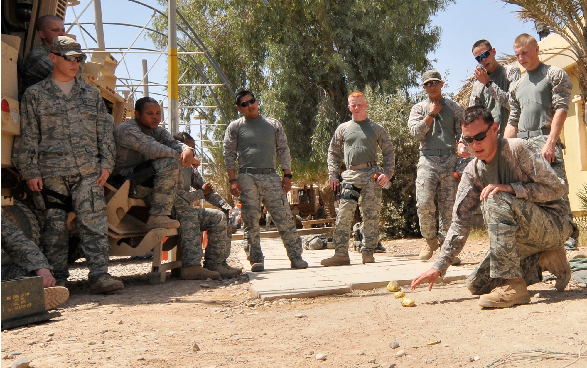 Airmen of the 532nd Expeditionary Security Forces Squadron known, as the “Lions,” prepare for a mission by running through rock drills July 9, 2010, Joint Base Balad, Iraq.  “These drills allow us to walk through any potential situation we may encounter so it won’t take us by surprise,” said Tech. Sgt. John Holloman, 532nd ESFS Lion 1-3 squad leader. Sergeant Holloman is a native of Mobile, Ala., deployed from Eielson Air Force Base, Alaska. (U.S. Air Force photo/Staff Sgt. Phillip Butterfield)