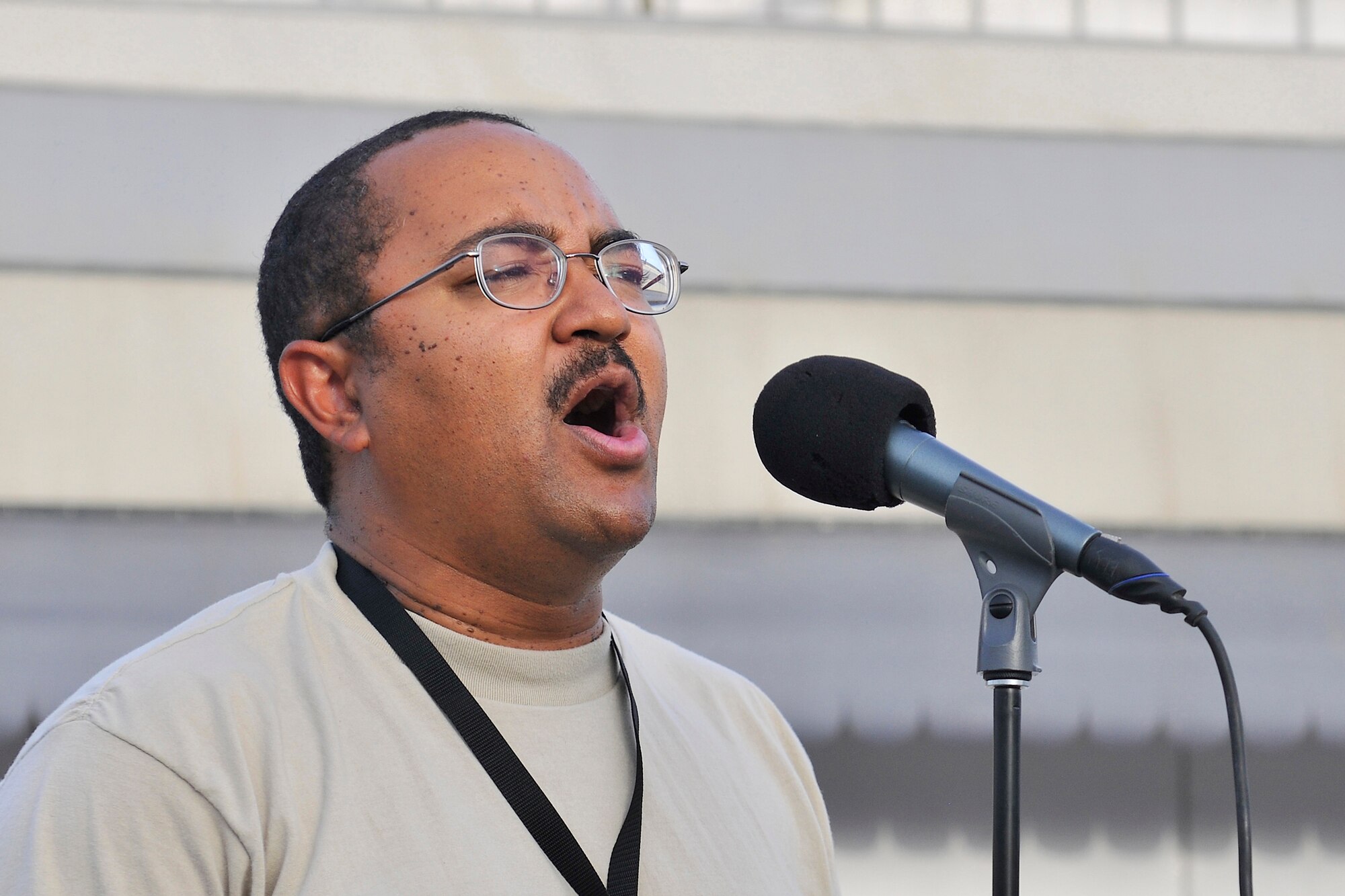 Master Sgt. Howard Boots, High Altitude saxophone player and vocalist, sings for troops during a performance at the Base Exchange at Bagram Airfield, Afghanistan, July 14, 2010. The U.S. Air Forces Central Expeditionary Band is the first permanently assigned Air Force Band to the Central Command Area of Responsibility. (U.S. Air Force photo/Staff Sgt. Christopher Boitz)
