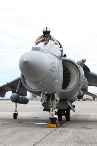 Capt. Aaron Hamblin, AV-8B Harrier II Plus pilot for Marine Attack Squadron 542, climbs into his aircraft before taking off during a training exercise here July 7. VMA-542 is in Iwakuni as part of the Unit Deployment Program. Their mission while here is to support Marine Aircraft Group 12 and the 31st Marine Expeditionary Unit.