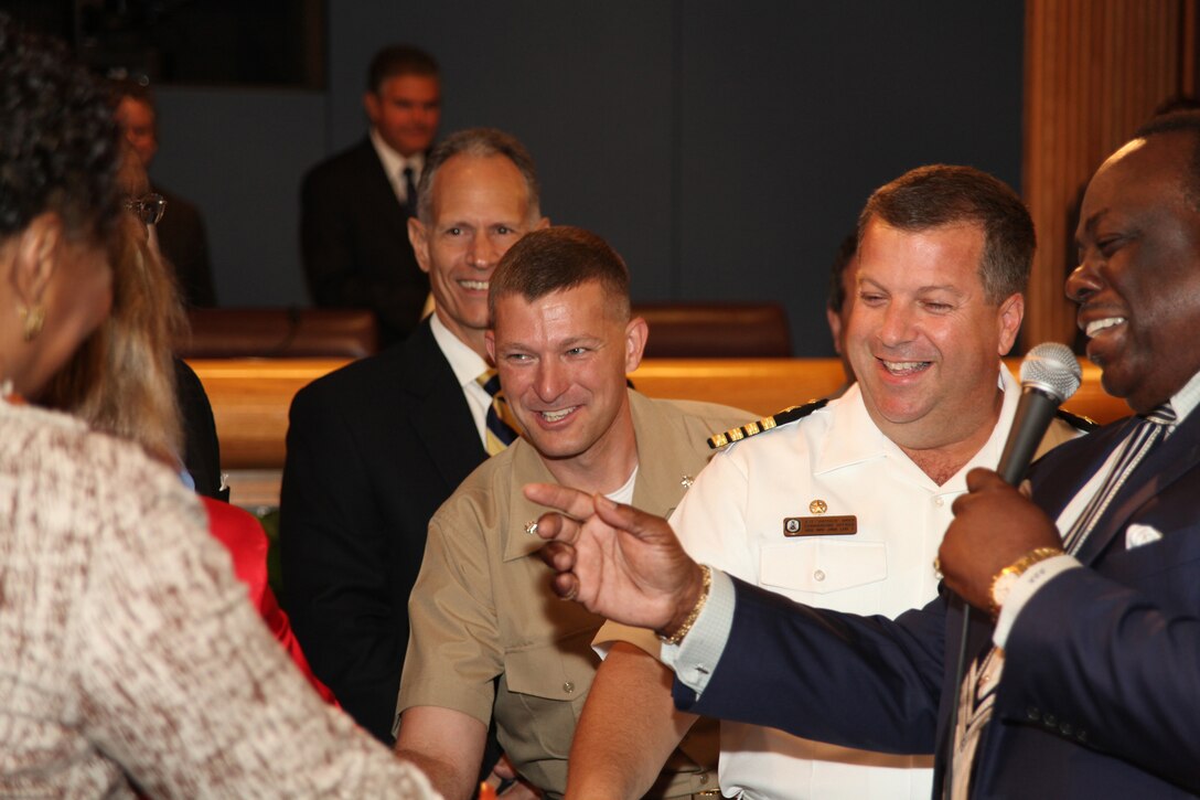 (Right) Miami-Dade County Commissioner Dorrin Rolle introduces Navy Capt. Jeff Amick and Lt. Col. Chris S. Richie to the board of county commissioners, July 20, 2010, during a county commissioners meeting in Miami, Fla. At the meeting, Miami-Dade County Mayor Carlos Alvarez presented Amick, commanding officer of USS Iwo Jima, and Richie, the Special-Purpose Marine Air-Ground Task Force Continuing Promise 2010 commanding officer, with a key to Miami-Dade County for the efforts of CP10’s upcoming humanitarian assistance to the Caribbean, Central and South America. Marines and Sailors aboard the USS Iwo Jima spent three days in Miami as their last stop in the United States.
