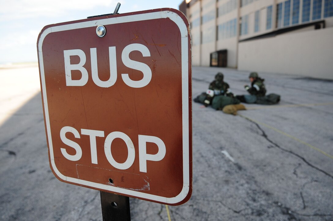 ELLSWORTH AIR FORCE BASE, S.D. – Airmen wait for a 28th Logistics Readiness Squadron bus during a phase II operational readiness exercise, July 20. The exercise is designed to mimic a deployed environment and test the combat abilities of Ellsworth’s Airmen. (U.S. Air Force photo/Airman 1st Class Corey Hook)