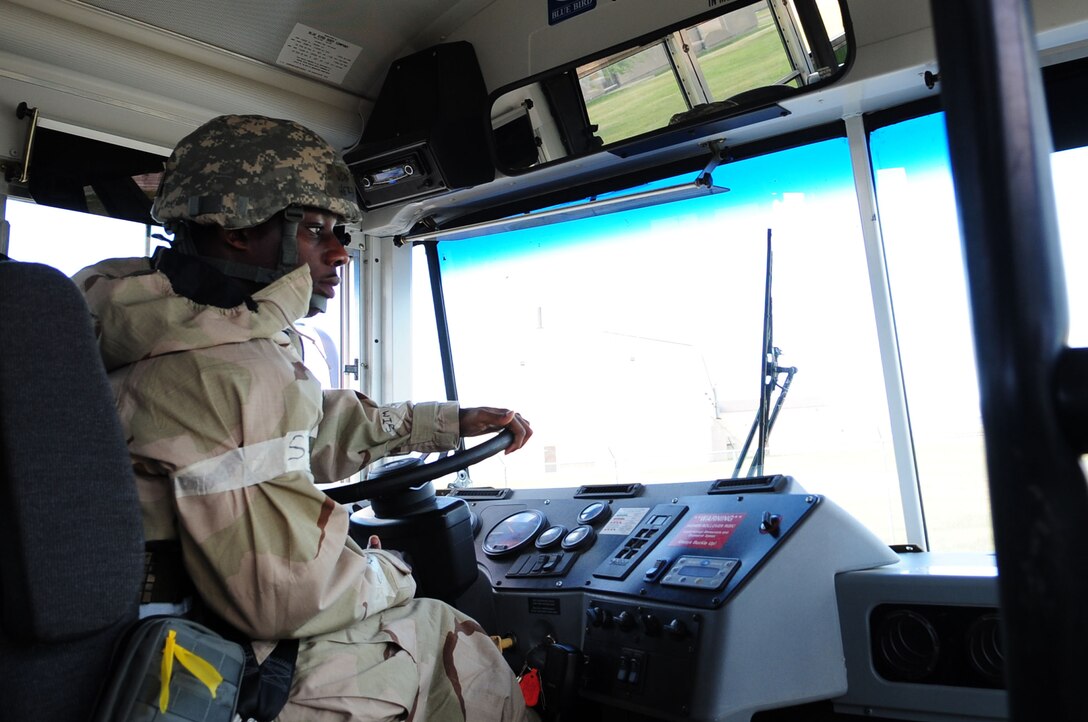 ELLSWORTH AIR FORCE BASE, S.D. – Airman Herb Shaw, 28th Logistics Readiness Squadron vehicle operator, drives a bus during the phase II operational readiness exercise, July 20. The ORE is designed to test Airmen across the base on their ability to operate in a deployed environment.  (U.S. Air Force photo/Airman 1st Class Corey Hook)