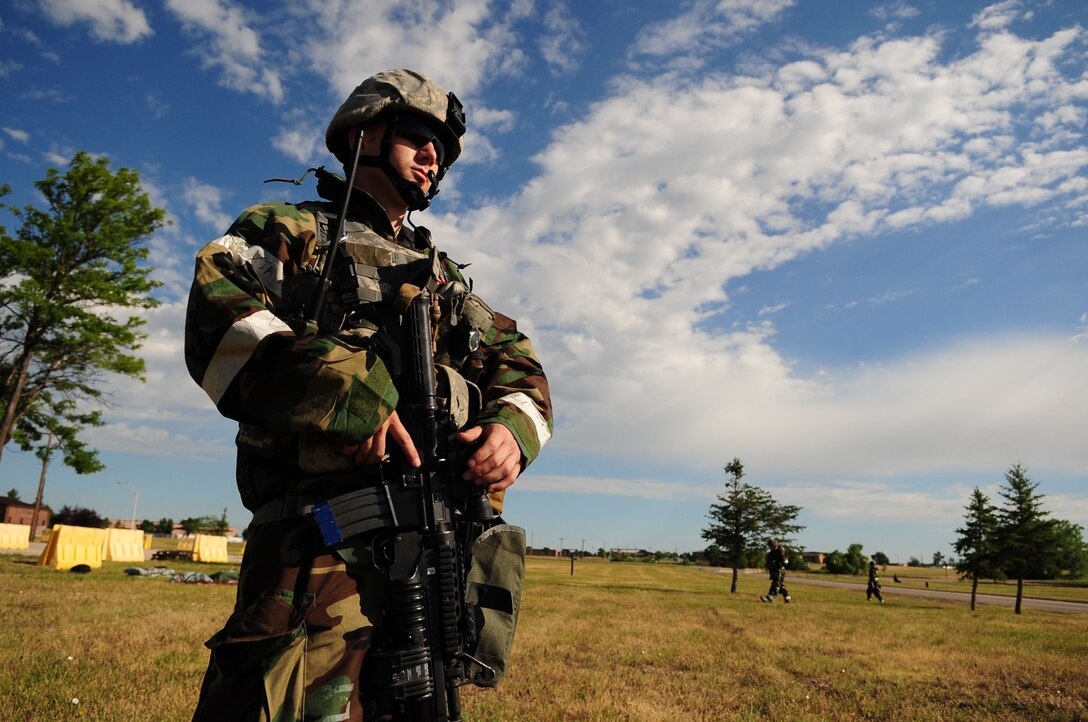 ELLSWORTH AIR FORCE BASE, S.D. – Senior Airman Chadwick Richardson, 28th Security Forces Squadron patrol leader, provides security during the phase II operational readiness exercise, July 20. Senior Airman Richardson, along with other security forces members, work 12-hour shifts during the exercise. (U.S. Air Force photo/Airman 1st Class Corey Hook)