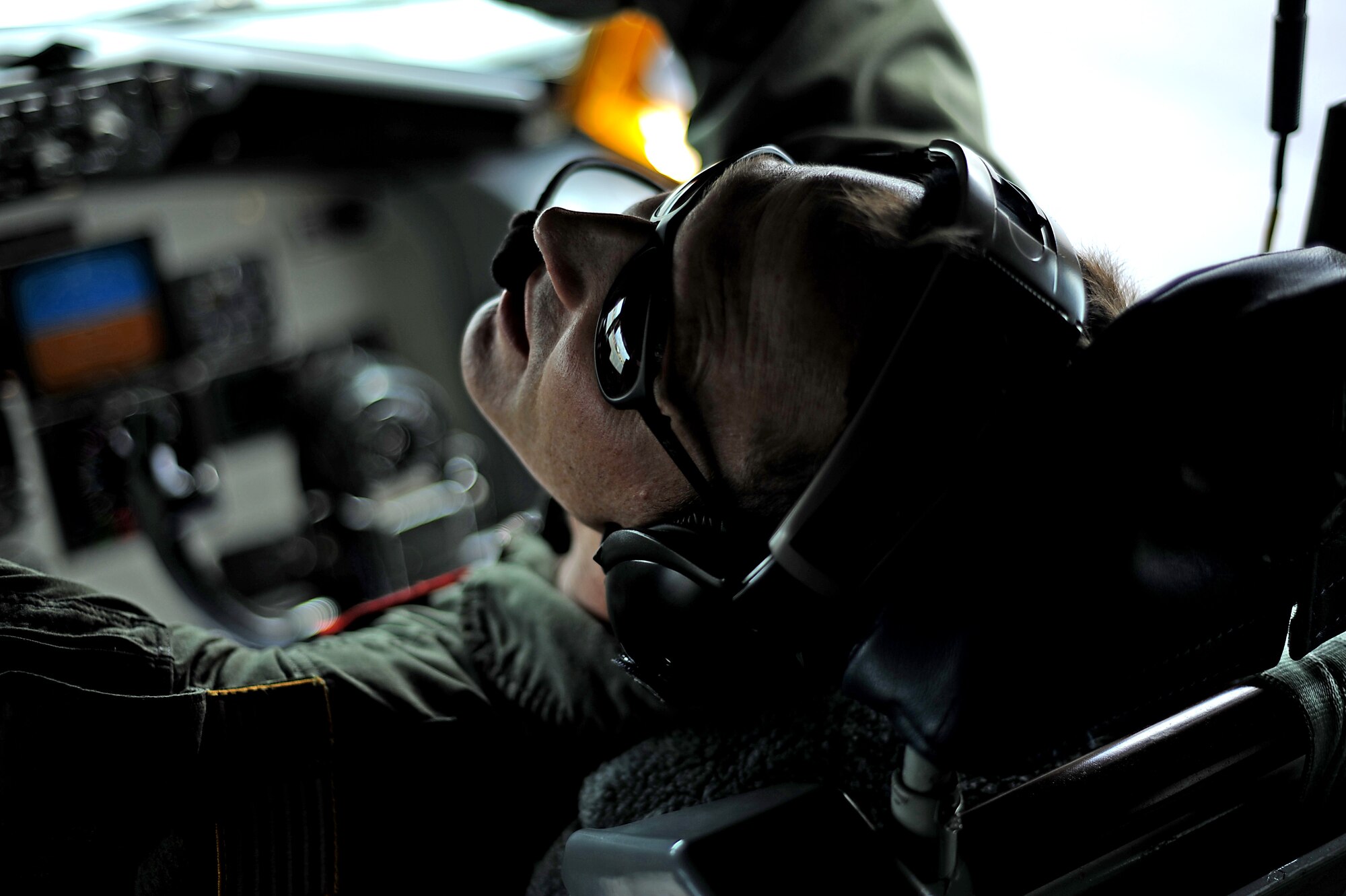 KC-135 Stratotanker Pilot Lt. Col.Marv Ashbaker with the 465th Air Refueling Squadron, Tinker AFB, Oklahoma pre-flights his plane before flying a refueling mission on July 8, 2010 in support of RIMPAC 2010 at Hickam AFB, Hawaii. RIMPAC 2010 is the 22nd in a series of significant international multilateral combined/joint military exercises scheduled biennially by U.S. Pacific Fleet and takes place here in the Hawaiian operating area. RIMPAC includes more than 14 nations, 34 ships, five submarines, more than 100 aircraft and more than 20,000 Soldiers, Sailors, Marines and Airman. RIMPAC enhances cooperation between partnering nations and practices our ability to plan, communicate, and execute operations. (U.S. Air Force photo by: MSgt Jeremy Lock) (Released)
