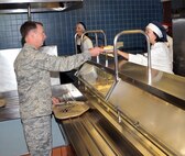 OFFUTT AIR FORCE BASE, Neb. - Lt. Gen. Glenn Spears, 12th Air Force commander, gets breakfast at the King Dining Facility July 14. General Spears ate with a group of young Airmen and discussed important topics currently facing the Air Force. This was General Spears' first official visit to Offutt and he was briefed on mission capabilities, saw new buildings, met with young Airmen and hosted a wing-wide all call. U.S. Air Force photo by Jeff W. Gates.