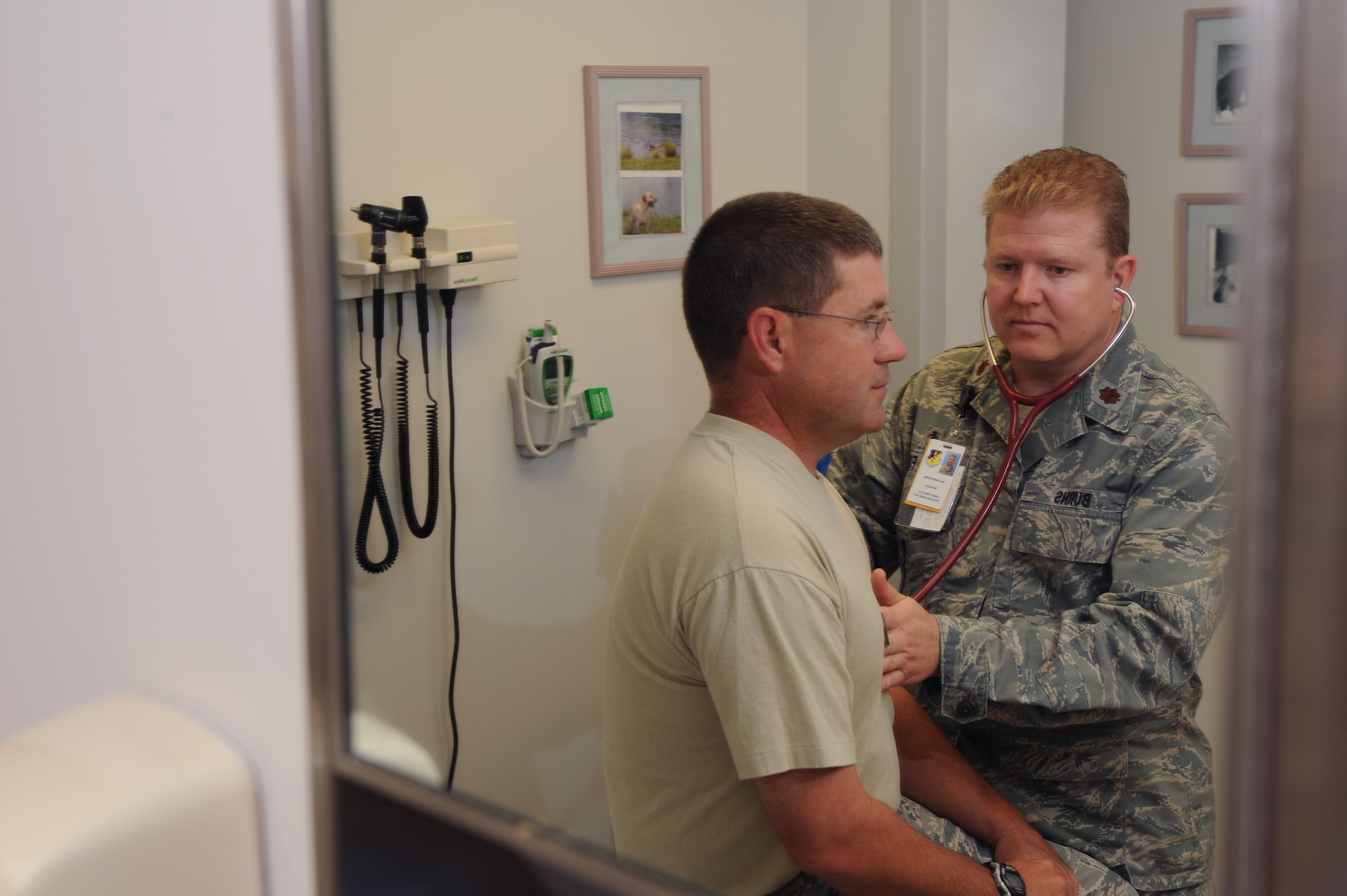 WHITEMAN AIR FORCE BASE, Mo., -- Maj. David Burns 509th Medical Operations Squadron physician assistant, listens for normal heart sounds to ensure proper opening and closing of a patient's heart valves. The 509th Medical Group recently completed a Health Services Inspection where they earned an overall outstanding rating. (U.S. Air Force photo/Staff Sgt. Jason Huddleston) (Released)

