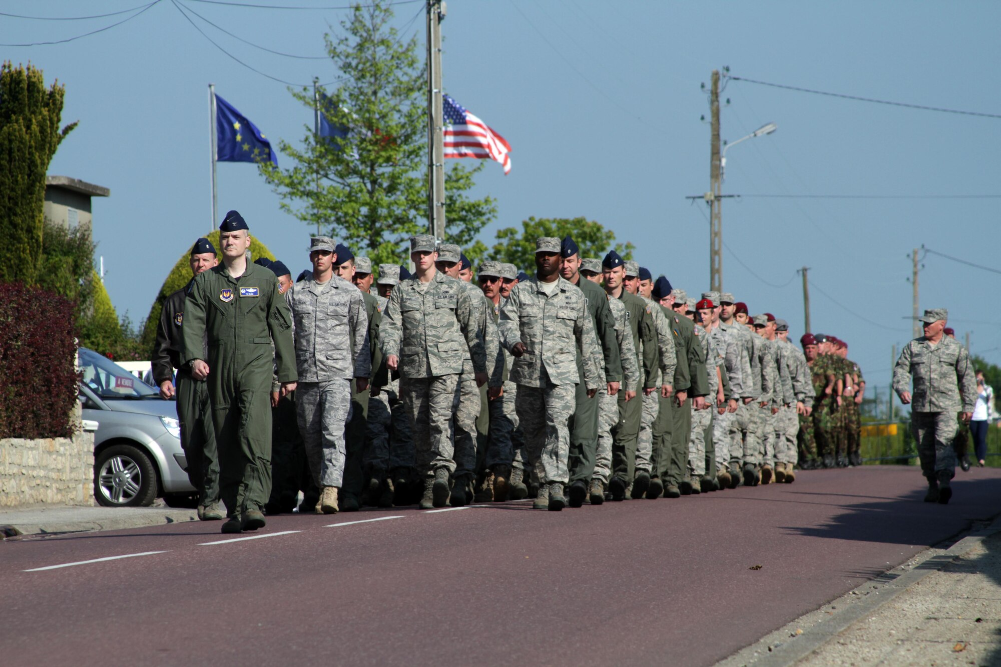 Members of the United States Air Force march in a commemorative parade near Nomandy France June 4. (Air Force Photo/Lt. Col. Howard Bell)