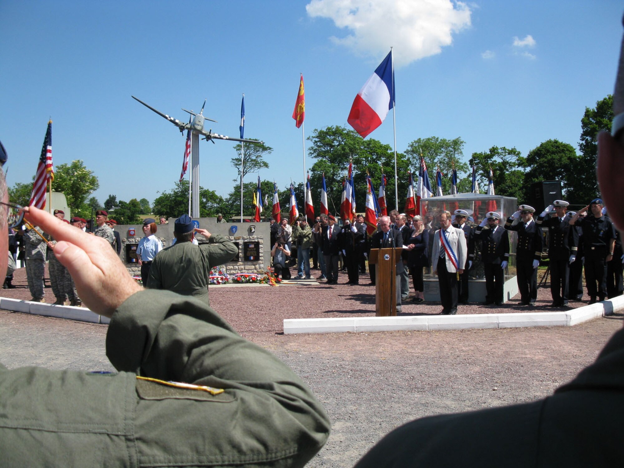 Members of the 96th Airlift Squadron participate in the commemorative ceremony at the WW II memorial in Picauville, France June 4. (Air Force Photo/Lt. Col. Howard Bell)