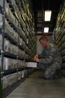 WHITEMAN AIR FORCE BASE, Mo., -- Airman 1st Class Ben Smyser, 509th Logistic Readiness Squadron Aircraft Part Store technician, fills a maintenance order that is needed for an aircraft on July 14.
(U.S. Air Force photo/Staff Sgt. Jason Huddleston) (Released)

