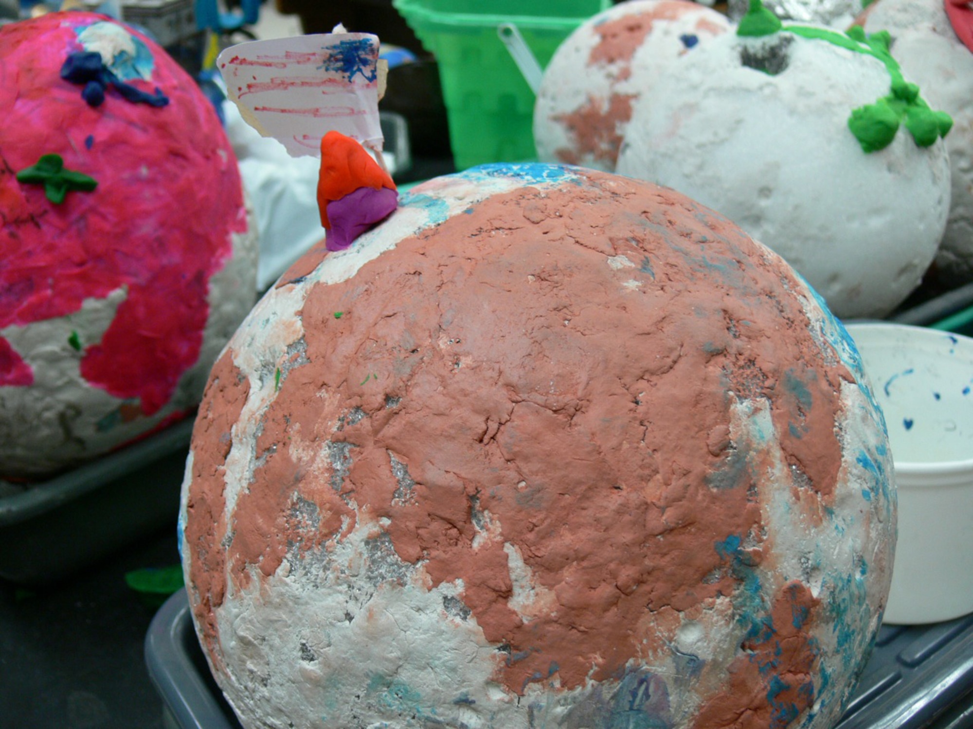 Children in the “Federation of Galaxy Explorers, Moon Base One Camp,” at Jack Swigert Aerospace Academy, a Peterson Air Force Base feeder school, made models of the moon as part of their moon studies July 12 to 16. It was the first space camp at Swigert school, which opened last year with its new aerospace-themed science and math curriculum. (U.S. Air Force photo/Monica Mendoza)