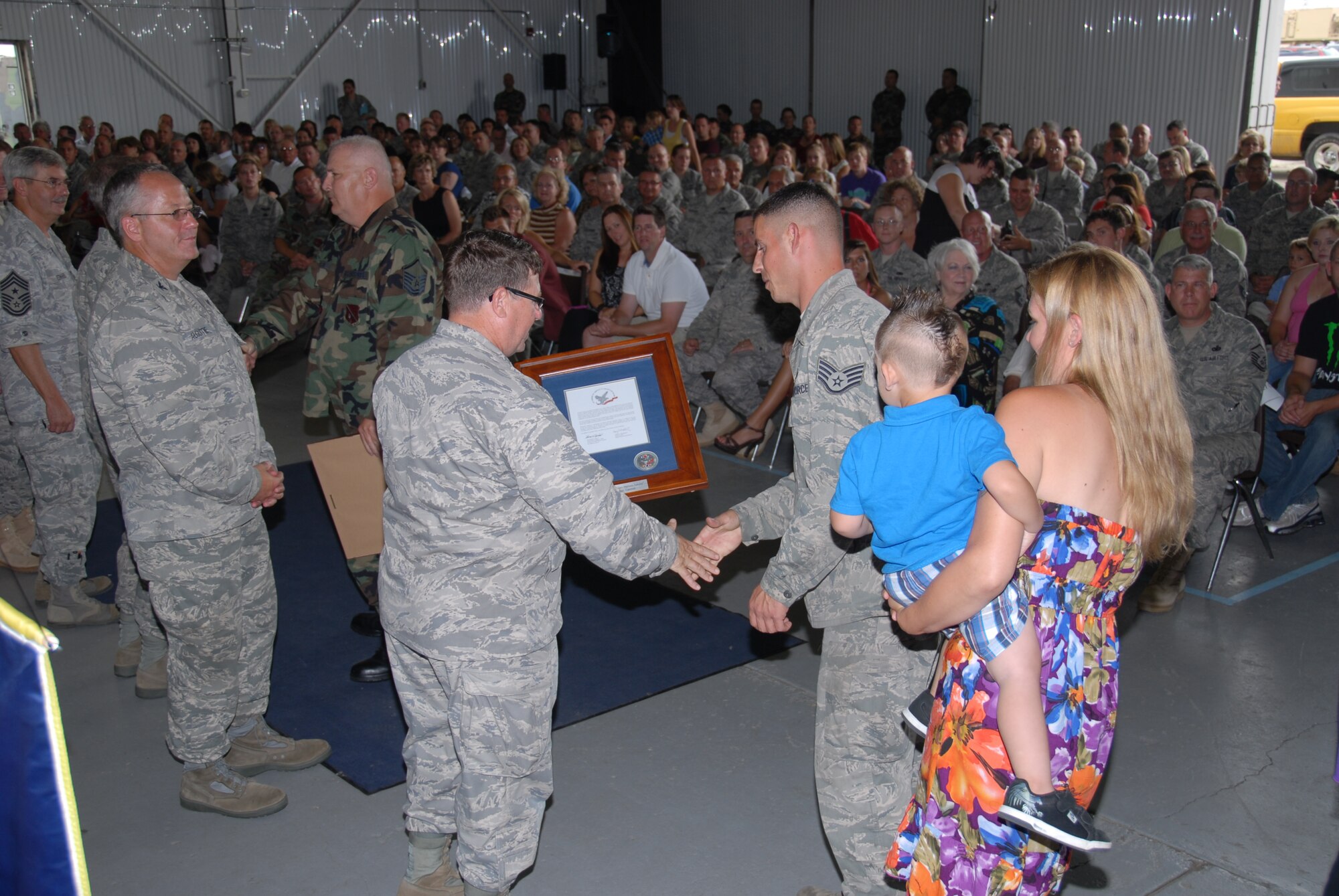 A "Welcome Home Hero Salute" held on July 18 at Selfridge Air National Guard Base included airmen of the 127th Aircraft Maintenance Squadron, the 127th Maintenance Squadron, the 127th Maintenance Group, The 127th Maintenance Operations Flight, the 127th Civil Engineer Squadron, and the 127th Medical Group.  The event commemorated 127th Wing Citizen-Airmen for their service while deployed for more than 30 consecutive days for Operations Noble Eagle, Enduring Freedom and Iraqi Freedom and all other contingency operations.  Photo by MSgt. Clancey Pence, 127th Public Affairs
