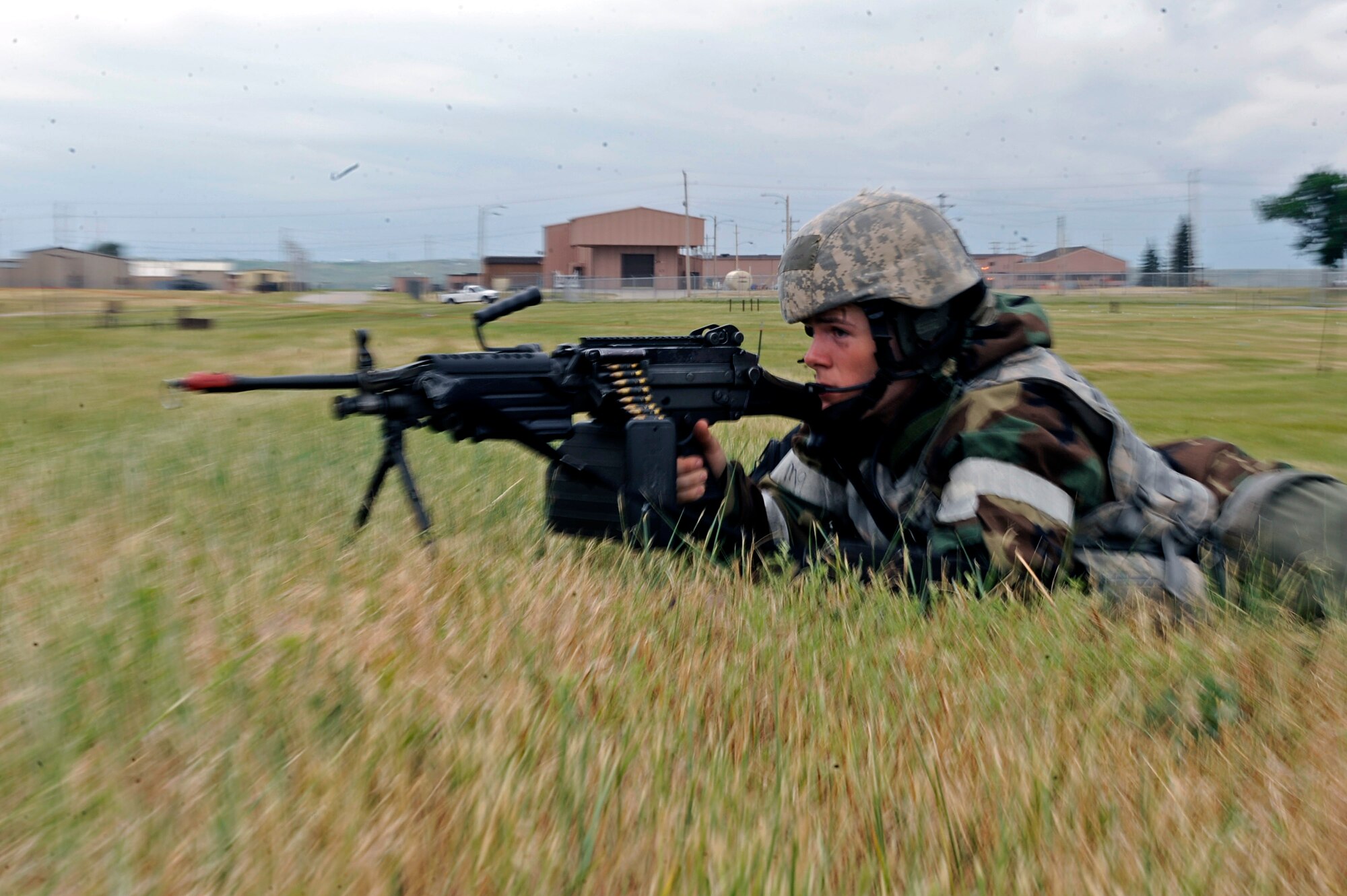ELLSWORTH AIR FORCE BASE, S.D. – Airman 1st Class Jordon Powers, 28th Security Forces Squadron patrolman, defends his position during a simulated ground attack of a phase II operational readiness exercise, July 21. Airman Powers, along with other security forces members, work 12-hour shifts during the exercise. (U.S. Air Force photo/Airman 1st Class Matthew Flynn)