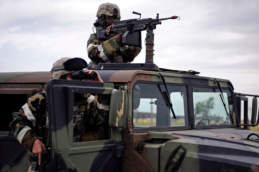 ELLSWORTH AIR FORCE BASE, S.D. – Airmen from the 28th Security Forces Squadron defend their position during a simulated ground attack of a phase II operational readiness exercise, July 21. The phase II ORE tests Airmen in a simulated deployed environment. (U.S. Air Force photo/Airman 1st Class Matthew Flynn)