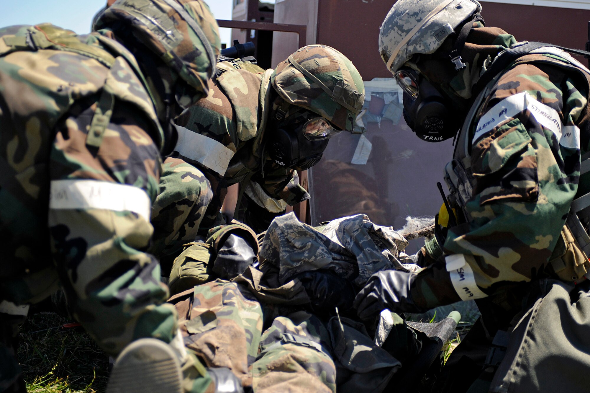ELLSWORTH AIR FORCE BASE, S.D. – Airmen from the 28th Civil Engineer Squadron prepare to transport an exercise victim to a medical facility after performing self-aid buddy care during a Phase II operational readiness exercise, July 20, 2010. Ellsworth Airmen will once again be required to handle these types of situations during the upcoming ORE July 9-12. (U.S. Air Force photo/Airman 1st Class Matthew Flynn)