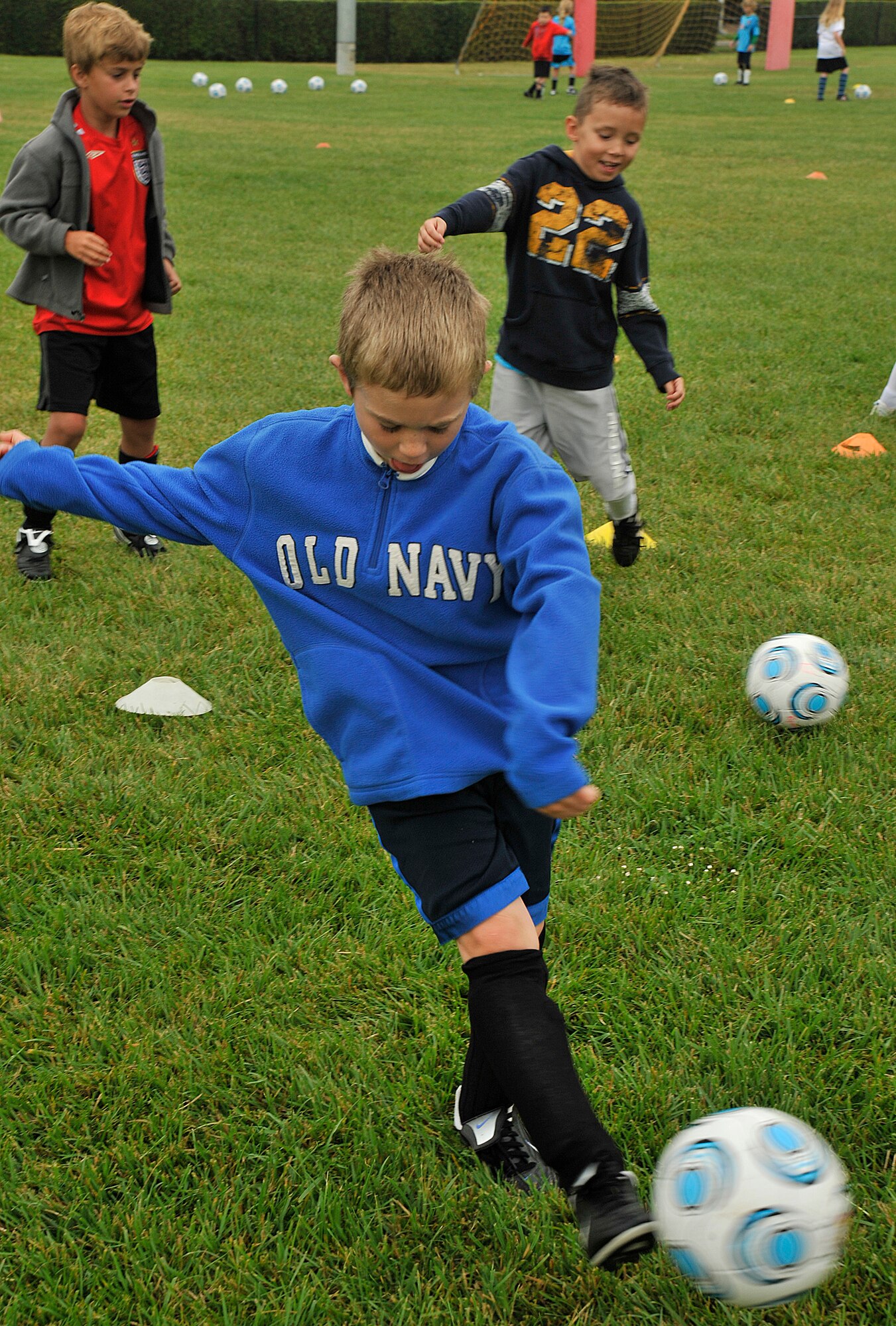 VANDNEBERG AIR FORCE BASE, Calif.--William Fernengel, son of Capt. Christopher Fernengel, of the14th Air Force passes the soccer ball here, Tuesday, July 20, 2010. Challenge Sports is holding their annual soccer camp at Vandenberg this week. (U.S. Air Force Photo/Senior Airman Stephanie Longoria)