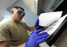 Staff Sgt. Mark Heitkamp prepares a fuel sample form to annotate the days tests on July 20, 2010 on Joint Base Charleston, S.C. Information noted from the days tests will then be transferred to their database for storing and reference. The fuel being tested is JP-8, a colorless sustance composed of a large number of chemicals that smells of kerosene. Sergeant Heitkamp is the noncommisioned office in charge of the fuels laboratory with the 628th Logistics Readiness Squadron. (U.S. Air Force photo/Senior Airman Timothy Taylor)