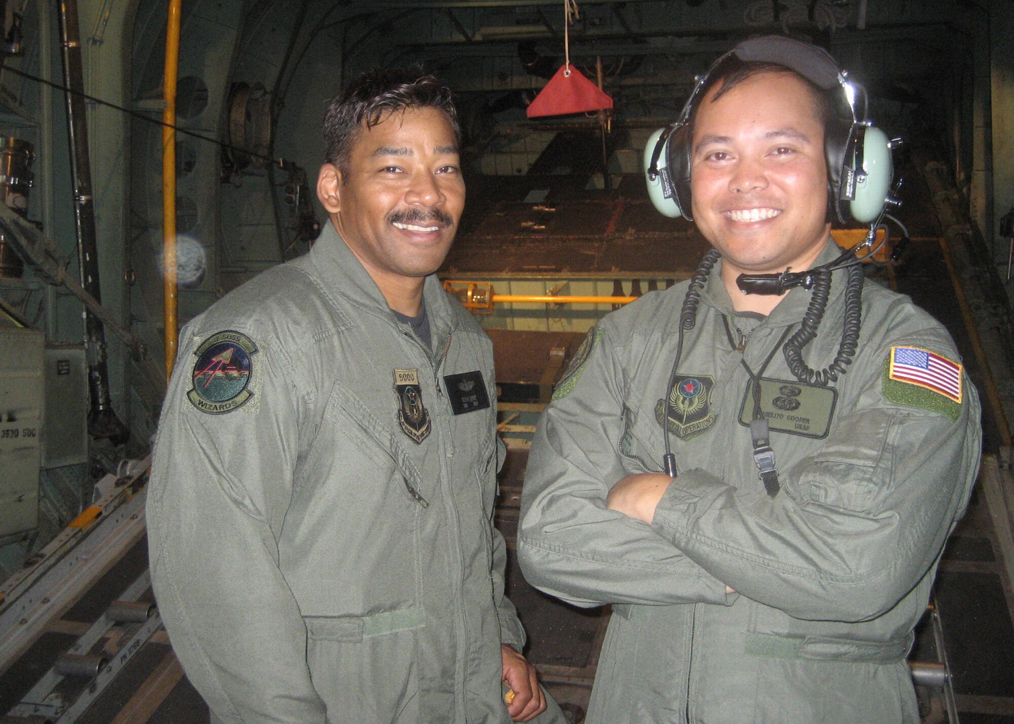 Tech. Sgt. Norman Bowie, 27th Special Operations Group, (left), and Staff Sgt. Angelito Cooper, 27th Special Operations Logistics Readiness Squadron, are two volunteer supporters of the Civil Air Patrol at Clovis, N.M. Individuals interested in learning more about or joining the CAP should call Richard Austin at (575) 714-0781. (U.S. Air Force photo by Greg Allen) (RELEASED)