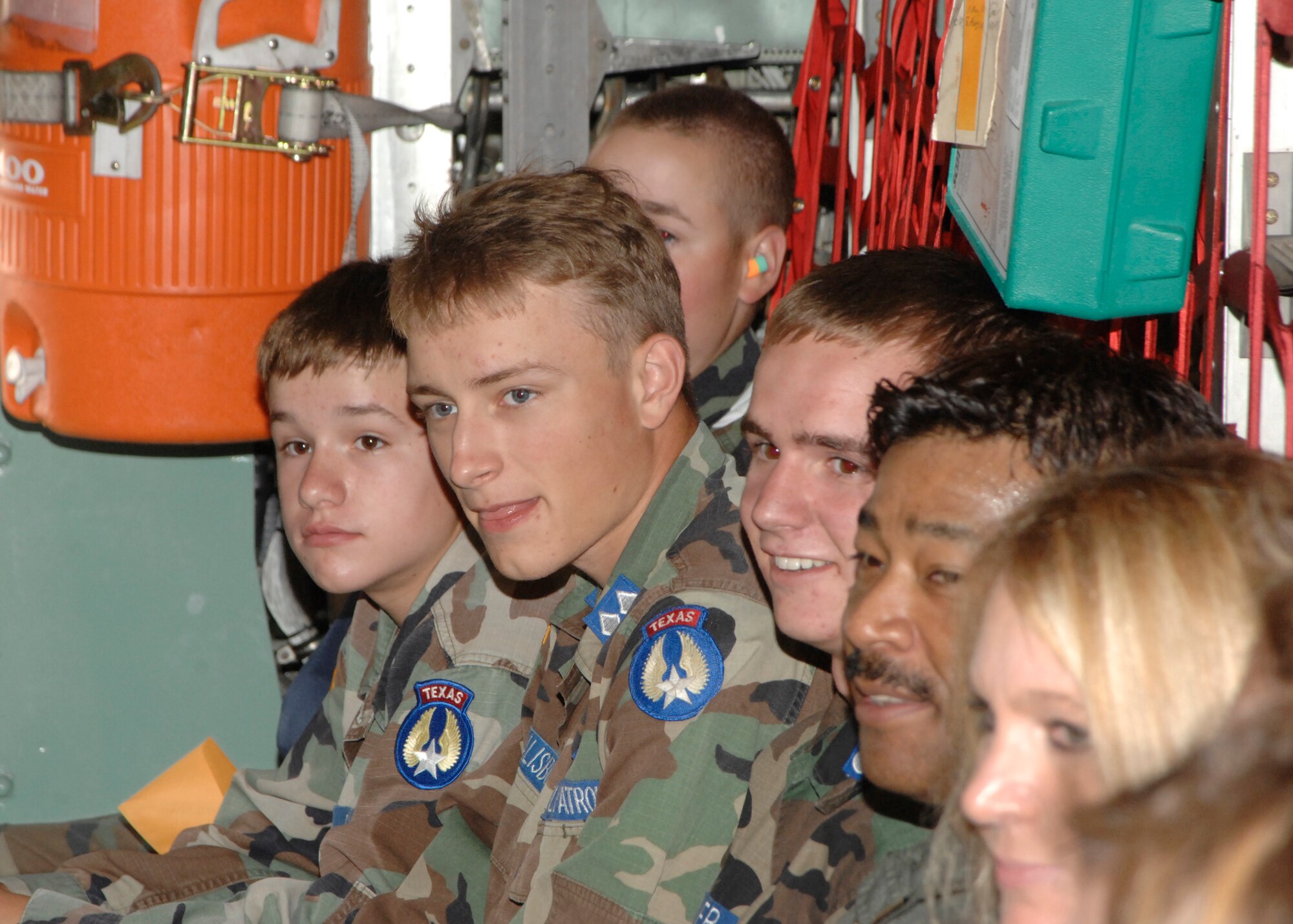 Civil Air Patrol cadets wait for their C-130 aircraft takes off for an orientation flight July 9, 2010 at Cannon Air Force Base, N.M. The cadets learned about the mission of the 27th Special Operations Wing and toured the base during their visit. (U.S. Air Force photo by Greg Allen) (RELEASED)