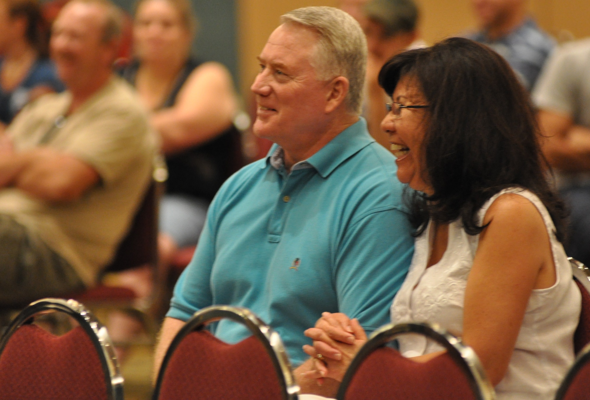 Col. William D. Stephens, 315th Mission Support Group commander, enjoys a moment of laughter with his wife during the Yellow Ribbon Reintegration event July 17-18 in Jacksonville, Fla. (U.S. Air Force Photo/Staff Sgt. Shane Ellis)