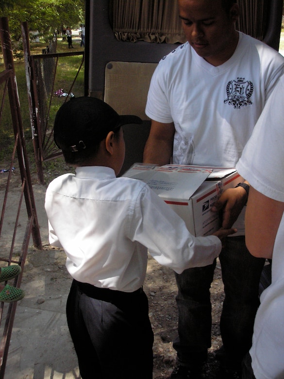 Members of the 376th Expeditionary Logistics Readiness Squadron recently delivered school supplies to the students of a local elementary school in Bishkek, Kyrgystan. The supplies were donated by Clinton, Mo. residents and 509th Logistics Readiness Squadron Airmen. (Courtesy photo)