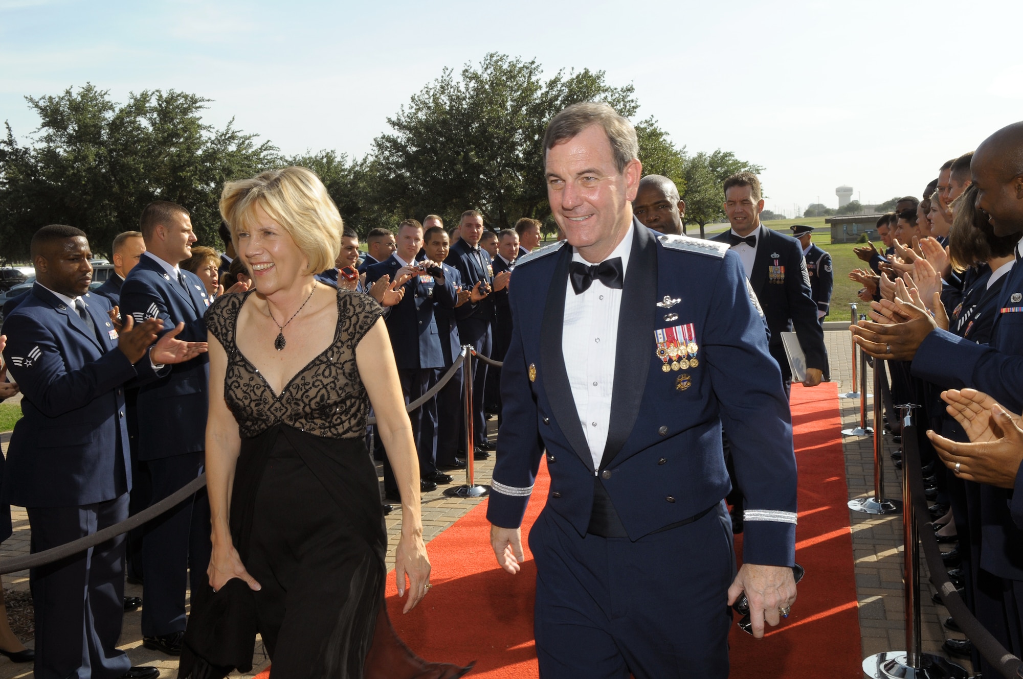 Gen. Stephen R. Lorenz and his wife, Leslie, arrive at the Gateway Club July 16, 2010, on Lackland Air Force Base, Texas, for his induction into the Order of the Sword. The Order of the Sword is the highest honor and tribute noncommissioned officers can bestow upon a person. General Lorenz is the Air Education and Training Command commander and is the sixth leader AETC Airmen have chosen to recognize by presenting the sword. (U.S. Air Force photo/Joel Martinez)