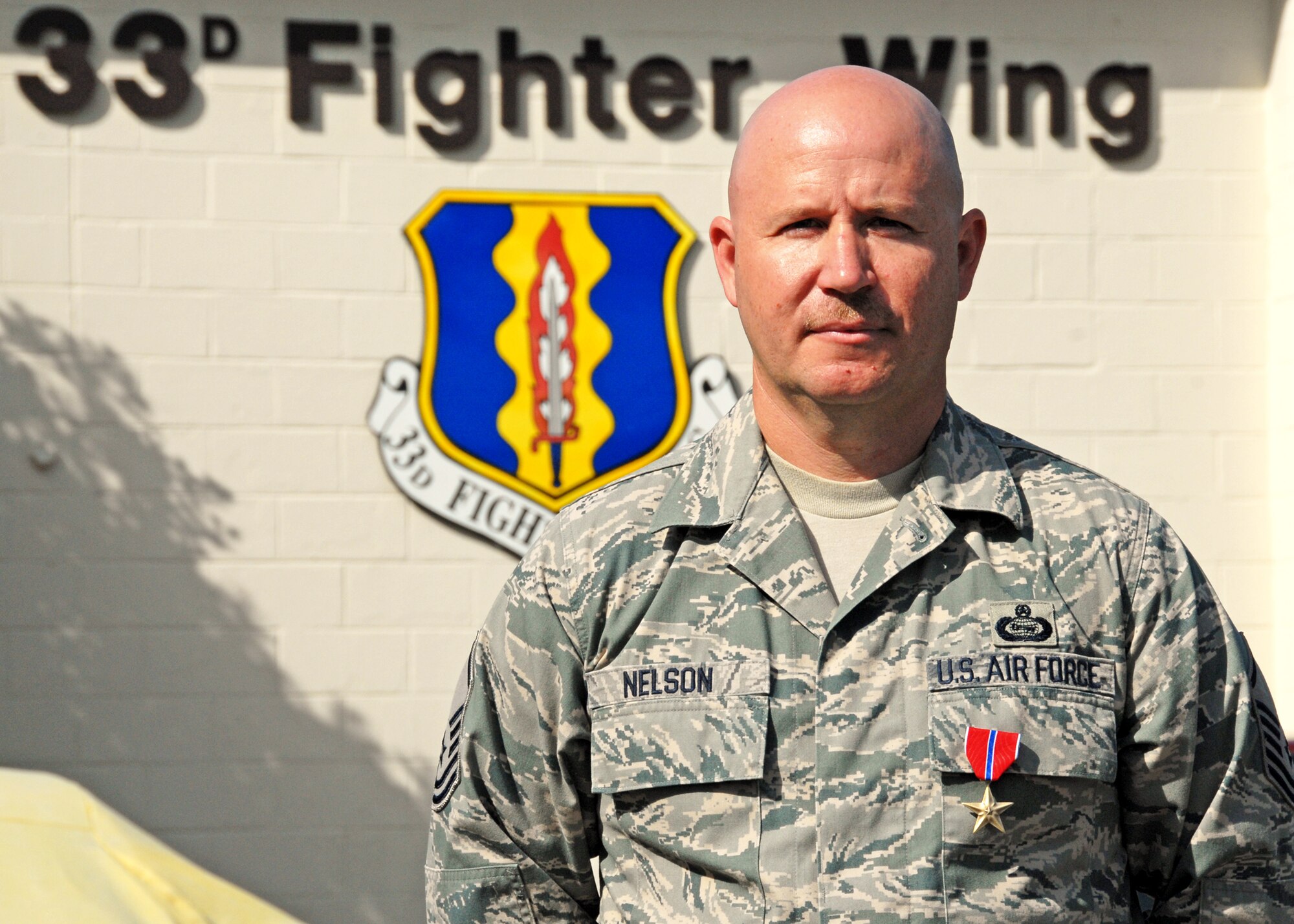 Congratulations to Master Sgt. James Nelson, 33rd Operations Group, on being awarded a Bronze Star for efforts on his recent deployment to Balad, Iraq.  Sergeant Nelson, part of the intel flight at the 33rd Fighter Wing since 2005, stayed with the wing to help in the transition to the Joint Strike Fighter.  (U.S. Air Force photo/Samuel King Jr.)