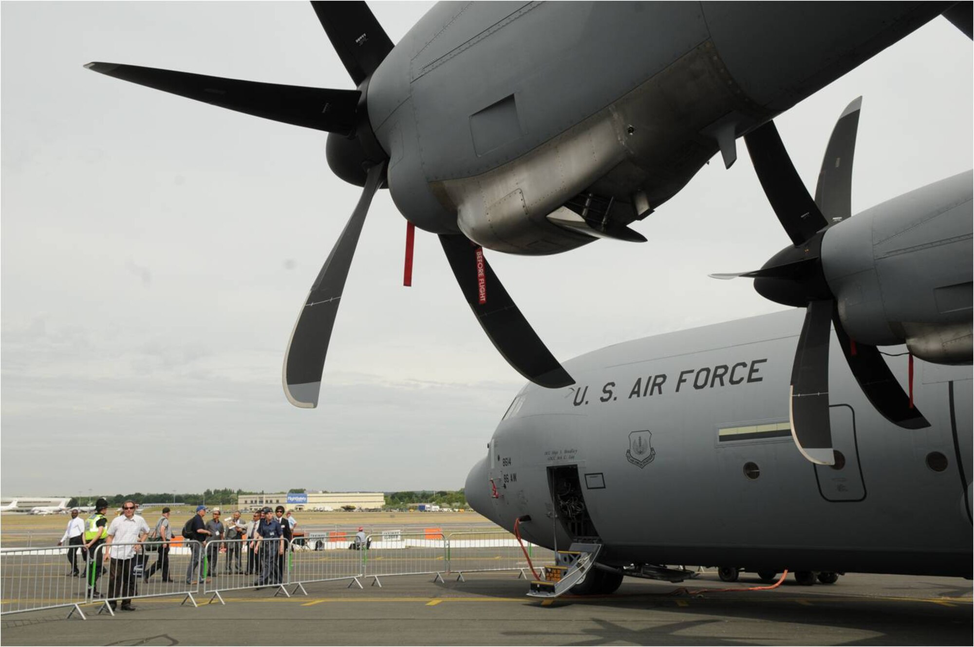 FARNBOROUGH, United Kingdom - Spectators view a C-130J Super Hercules from Ramstein Air Base, Germany, at the 2010 Farnborough International Air Show July 20. The air show takes place July 19-25 with approximately 1,300 exhibitors from private, commercial civil and military sectors, 132,000 trade visitors and nearly 153,000 public visitors. (U.S. Air Force photo/Staff Sgt. Heather M. Norris)
