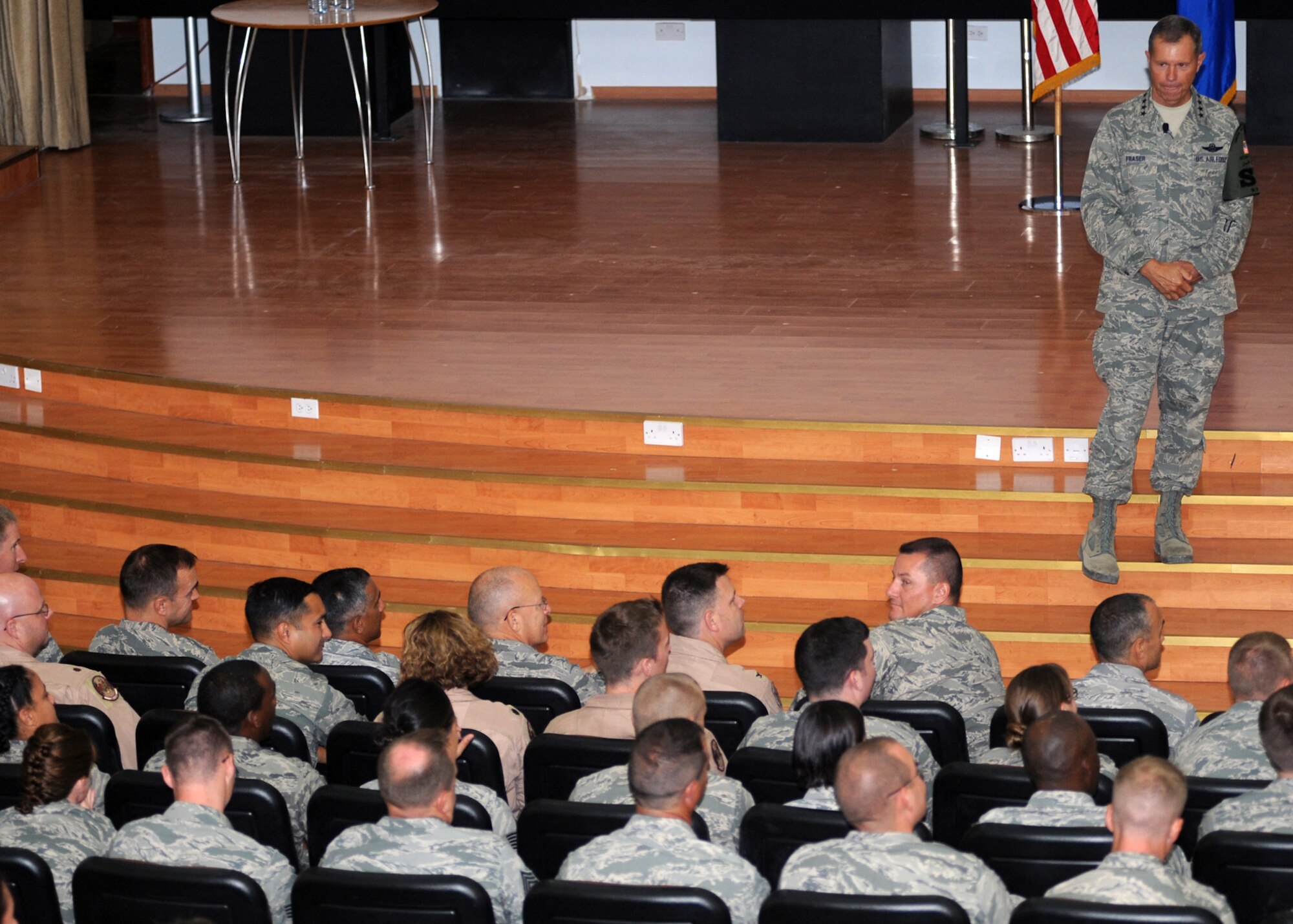 SOUTHWEST ASIA - Gen. William M. Fraser III, commander of Air Combat Command, speaks with members of the 386th Air Expeditionary Wing during his visit to an undisclosed air base here July 18, 2010. General Fraser held an Airmen's Call at the base theater, where Airmen were given the opportunity for a question-and-answer session. (U.S. Air Force photo by Senior Airman Laura Turner/Released)