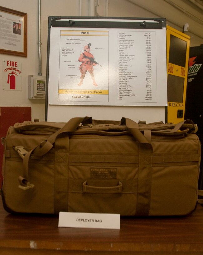 The Deployer Bag is designed to store the $6,600 - $7,000 worth of combat equipment Marines deploying to Afghanistan are issued. The bag offers Marines an easily-accessible storage unit, equipped with wheels and straps for ease and comfort when traveling throughout a deployment.