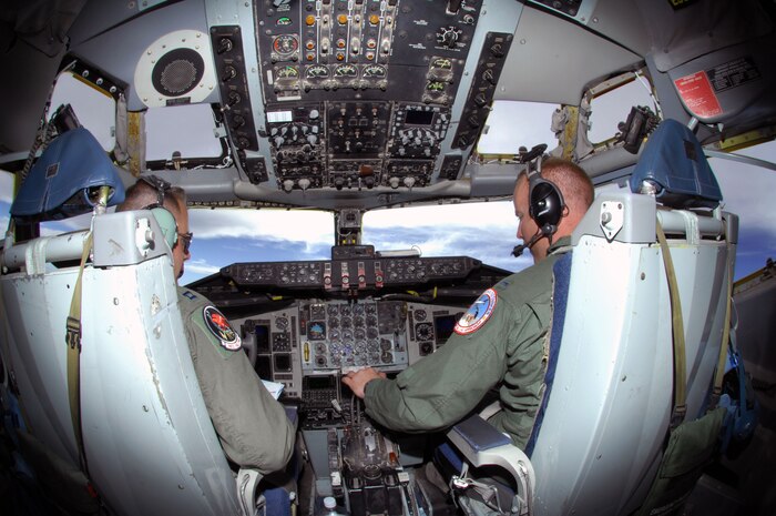 NELLIS AIR FORCE BASE, Nev. -- Capt. Nicholas Motlagh and Air Force 1st Lt. Matthew Douglass, KC-135 pilots from 350th Air Refueling Squadron, McConnell Air Foce Base, Kan., monitor the controls of their aircraft during a Red Flag 10-4 mission July 21, 2010. Red Flag is a realistic combat training exercise involving the air forces of the United States and its allies. The exercise is hosted north of Las Vegas on the Nevada Test and Training Range--the U.S. Air Force's premier military training area with more than 12,000 square miles of airspace and 2.9 million acres of land. With 1,900 possible targets, realistic threat systems and an opposing enemy force that cannot be replicated anywhere else in the world, Nellis and the NTTR are the home of a "peacetime battlefield," providing combat air forces with the ability to train to fly, fight and win together.  (U.S. Air Force photo by Airman 1st Class Daniel Phelps)