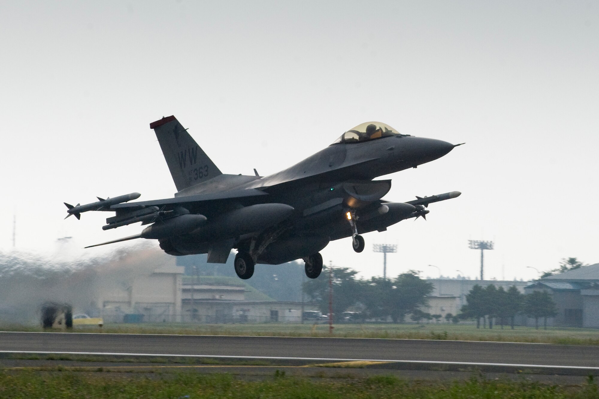 MISAWA AIR BASE, Japan -- An F-16 Fighting Falcon with the 13th Fighter Squadron takes off for deployment to Alaska July 23. More than 170 Airmen from the 13th FS and the 35th Maintenance Group deployed throughout the week to participate in exercises Distant Frontier and Red Flag-Alaska. (U.S. Air Force photo/Senior Airman Jamal D. Sutter)