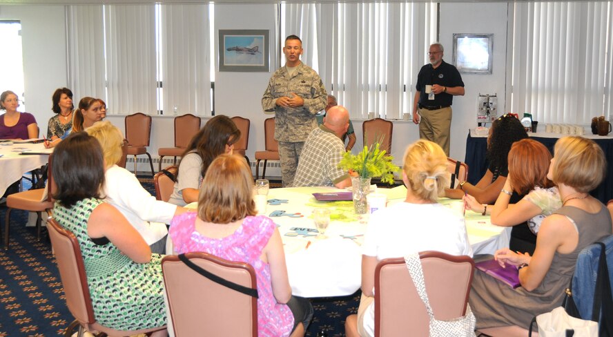 Chief Master Sgt. James J. Patrie, 377th Mission Support Group superintendent, addresses spouses during the Heart Link orientation July 16 at the Mountain View Club. U.S. Air Force Photo by Dennis Carlson