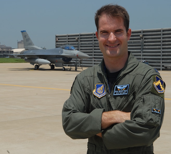 KUNSAN AIR BASE, Republic of Korea – Capt. Ryan Riley, 35th Fighter Squadron instructor pilot, poses in front of one of the squadron's F-16 Fighting Falcon aircraft. Captain Riley was recently selected to join the Air Force Thunderbirds team as Thunderbird No. 2, the left wing for the squadron. (U.S. Air Force photo/Senior Airman Roy Lynch)