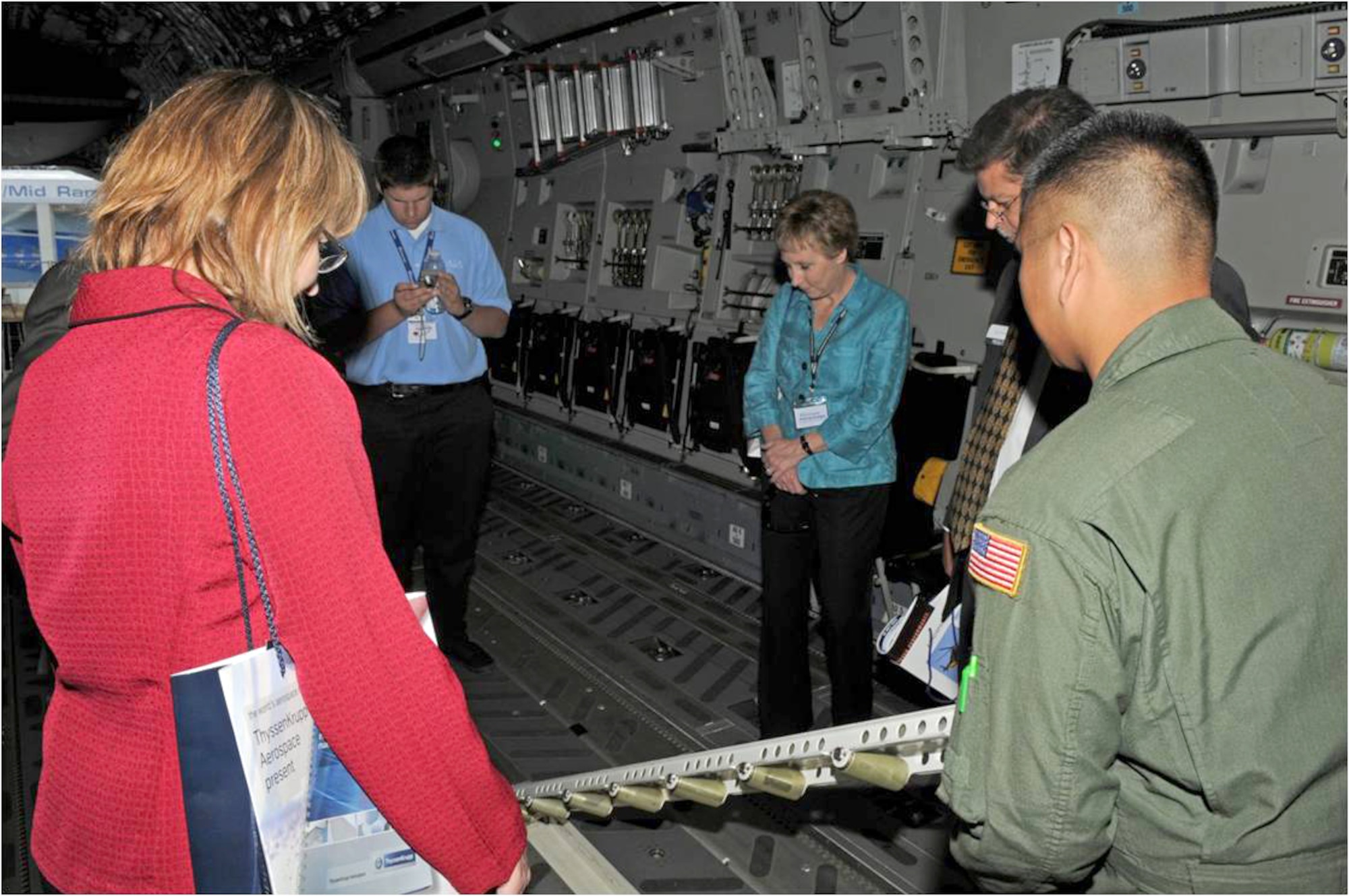 Spectators tour the cargo bay of a C-17 Globemaster III from Travis Air Force Base, Calif., July 20, 2010, in Farnborough, England. Eleven U.S. military aircraft and approximately 70 personnel representing all branches of service participate in the 2010 Farnborough International Air Show. (U.S. Air Force photo/Staff Sgt. Jerry Fleshman) 